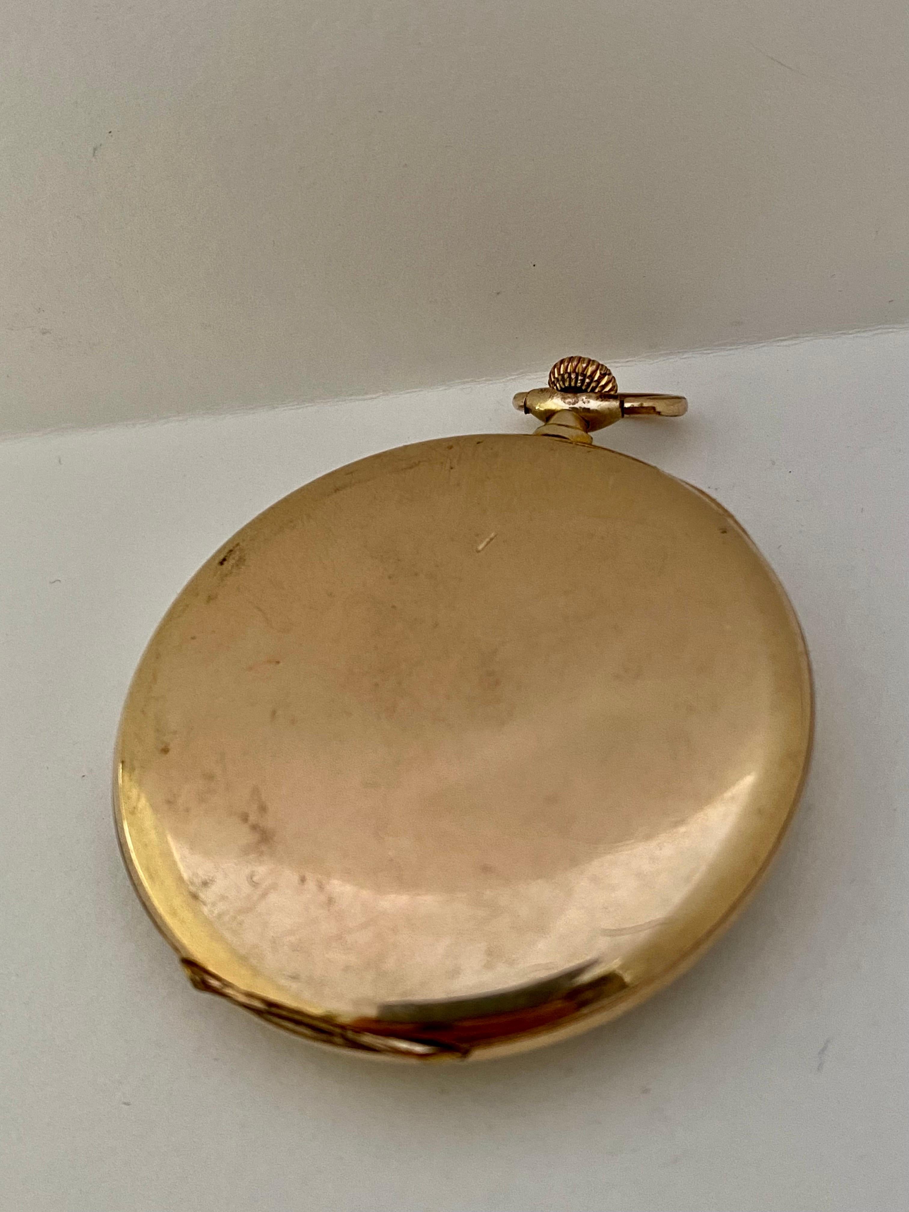 This beautiful 47mm diameter (excluding crown) Keyless mechanical Swiss pocket watch is in good working condition and it is running well. Visible signs of ageing and wear with tiny surface marks on the silvered dial and on the glass and watch case.