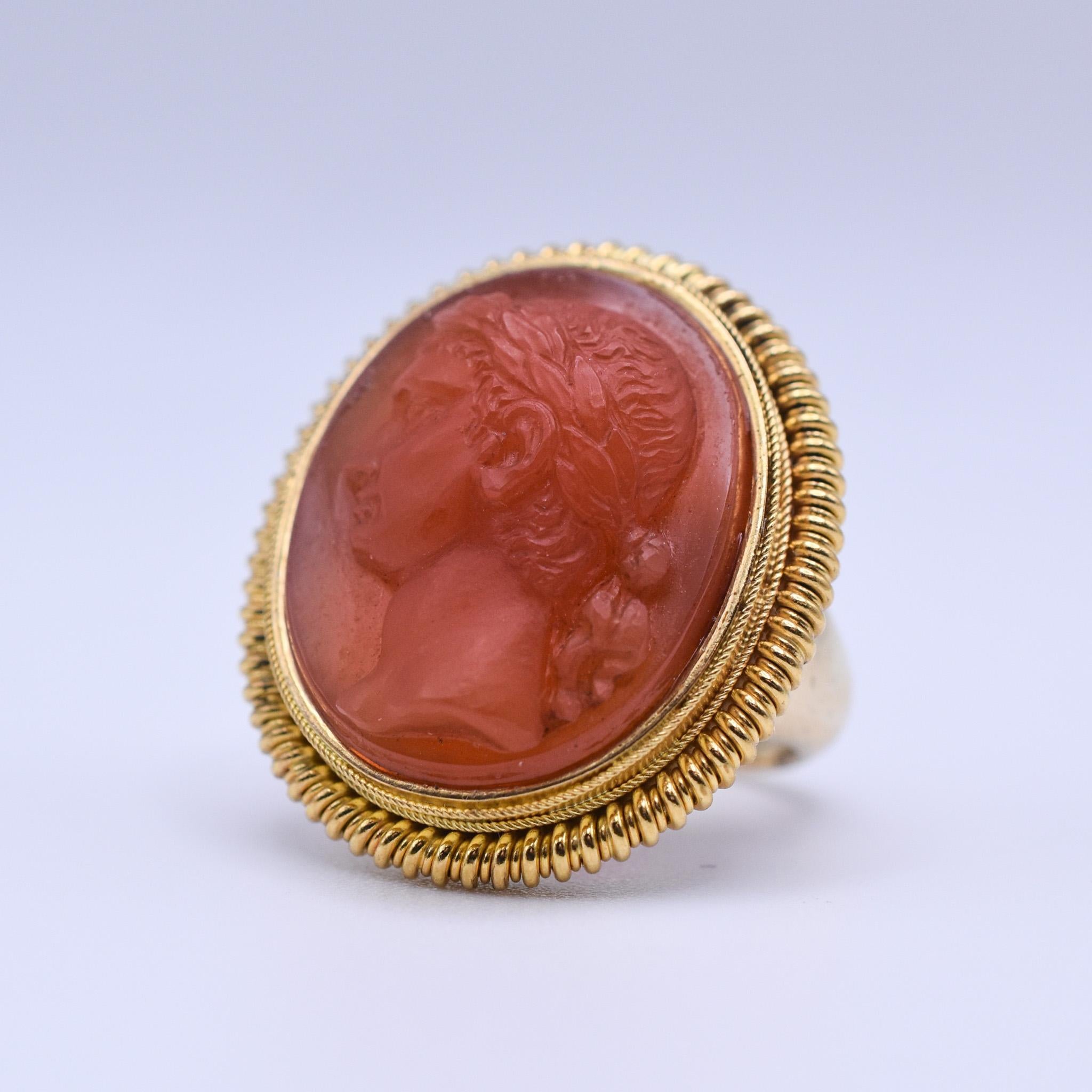 An elegant Roman Carnelian Cameo Ring crafted in 18k yellow gold. 
Epoca Impero, Early 19th Century.

Ring size: US 5.5

