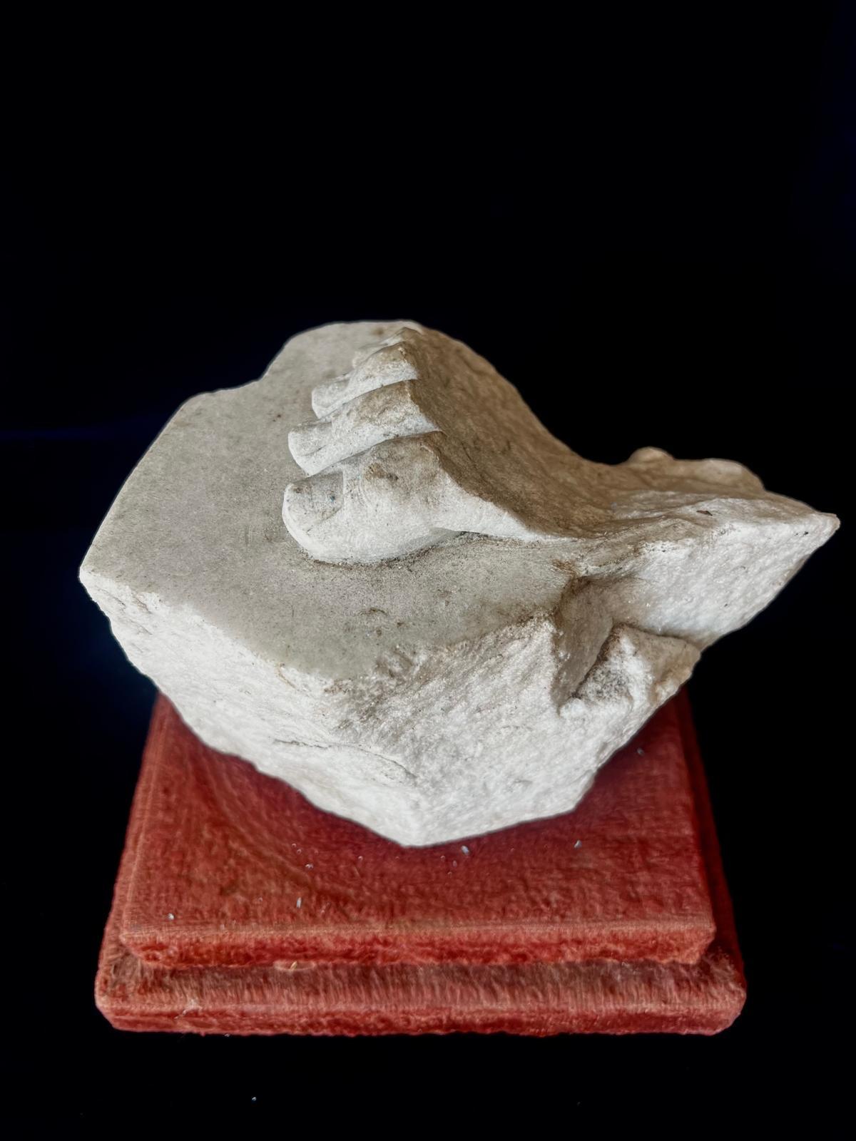 The bottom of a life size marble woman’s sculpture, Roman Empire ,- a woman foot with the toes. A very decorative piece and part of the Roman Empire history.
 It’s rested for display on the 19th century red velvet pedestal. 