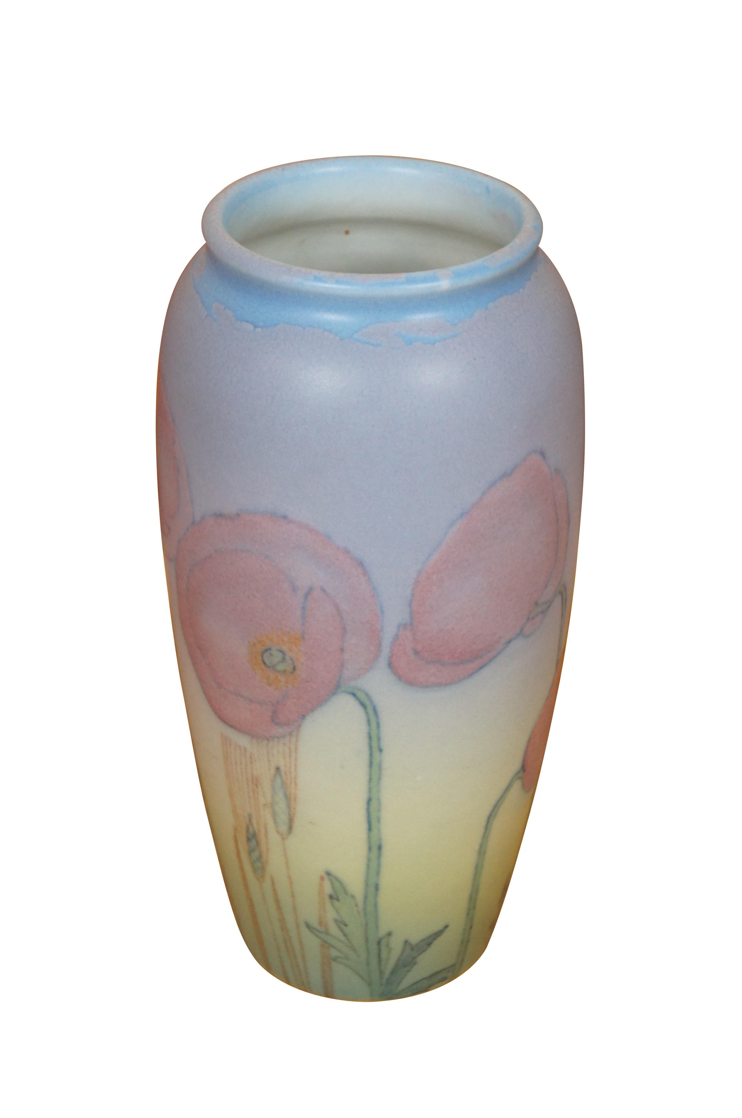 Antique Rookwood Kataro Shirayamadani mantel urn / bud / flower vase featuring art deco floral design in Vellum.  892 shape code, Size C, signed in Japanese by artist.  Marked XXXV

Kataro Shirayamadani was born in Kanazawa, Japan in 1865. His name