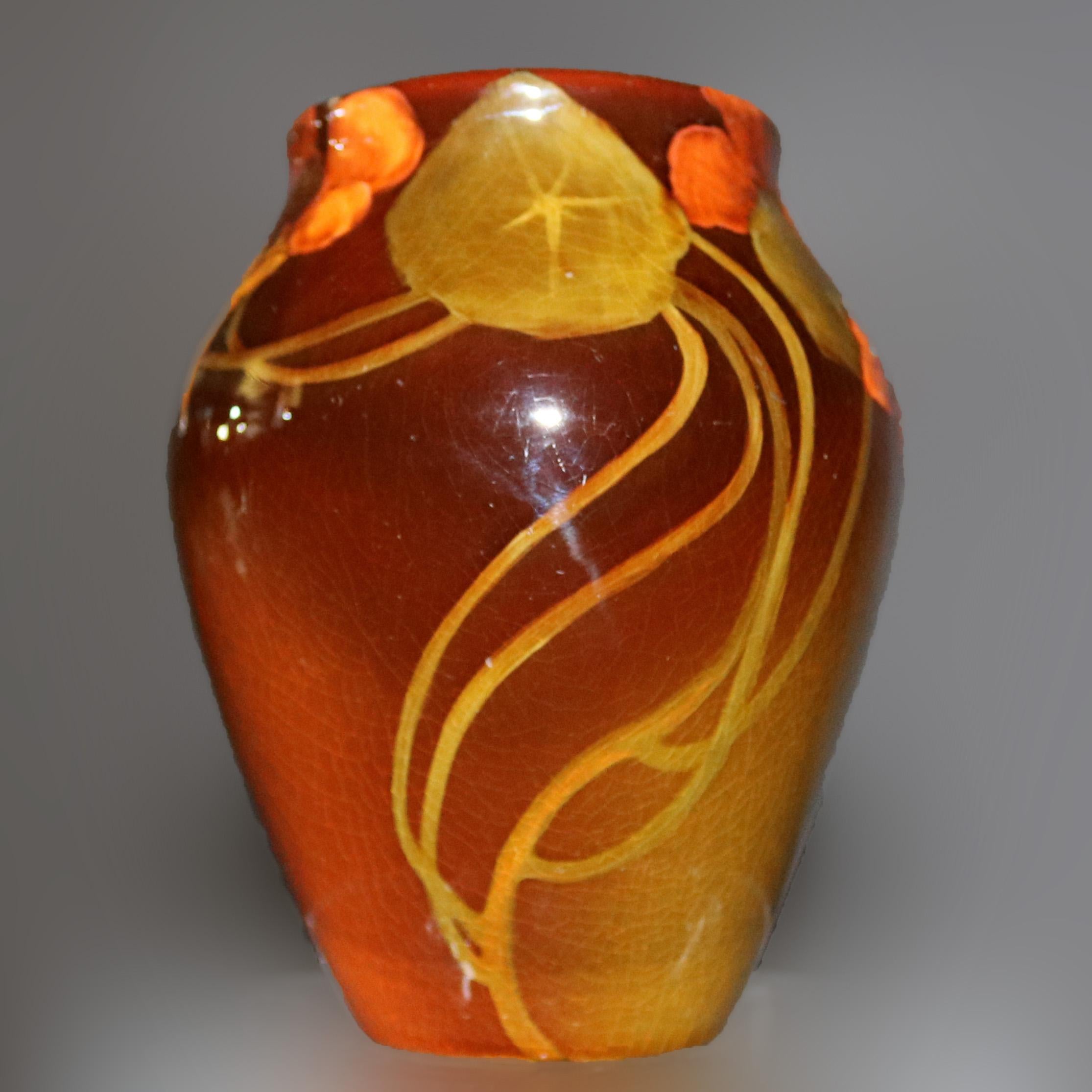 An antique artist-signed art pottery vase by Sallie Toohey of Rookwood offers standard glaze with floral decoration, maker stamp and artist signature on base, 1903

Measures: 5.5