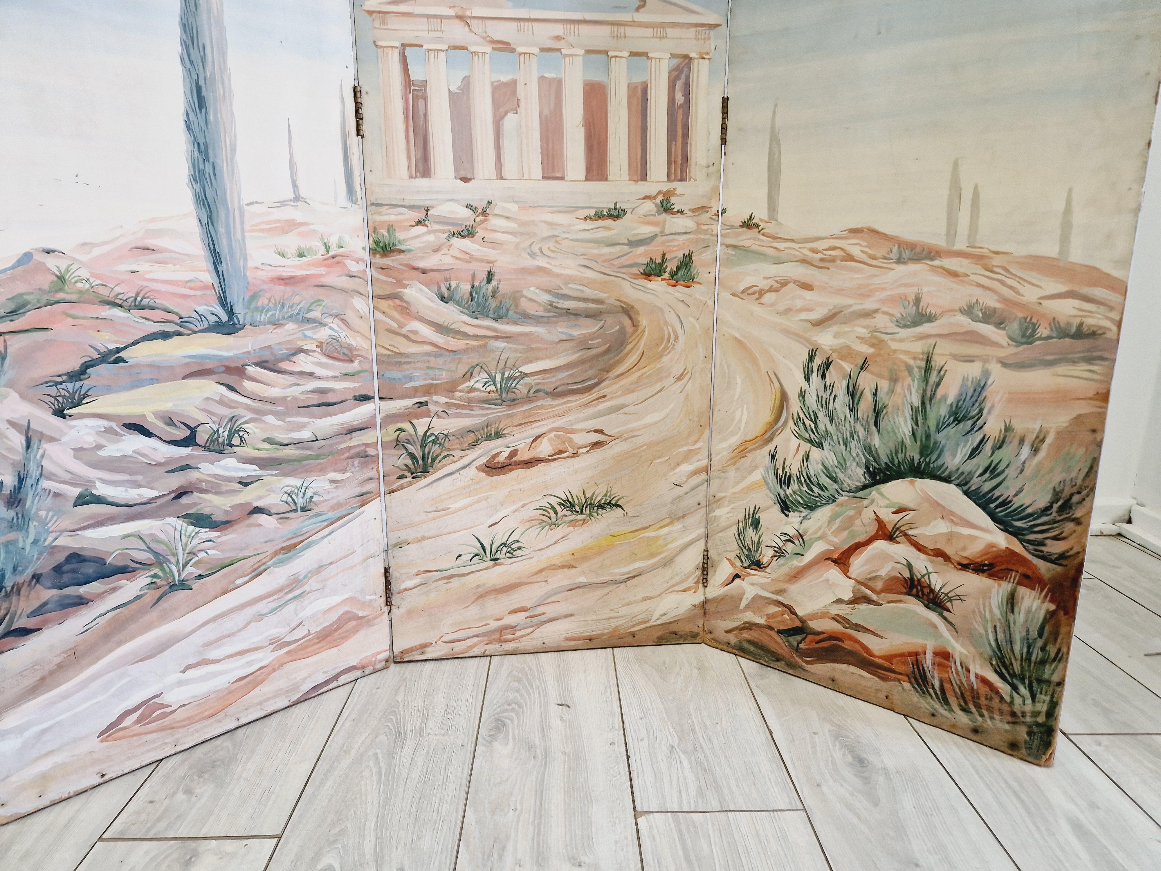 This stunning 4 Panel Room Divider screen from France is sure to make a statement in any room. Handmade with attention to detail, this free-standing screen features a beautiful Roman landscape theme that has been hand-painted onto the wooden panels.