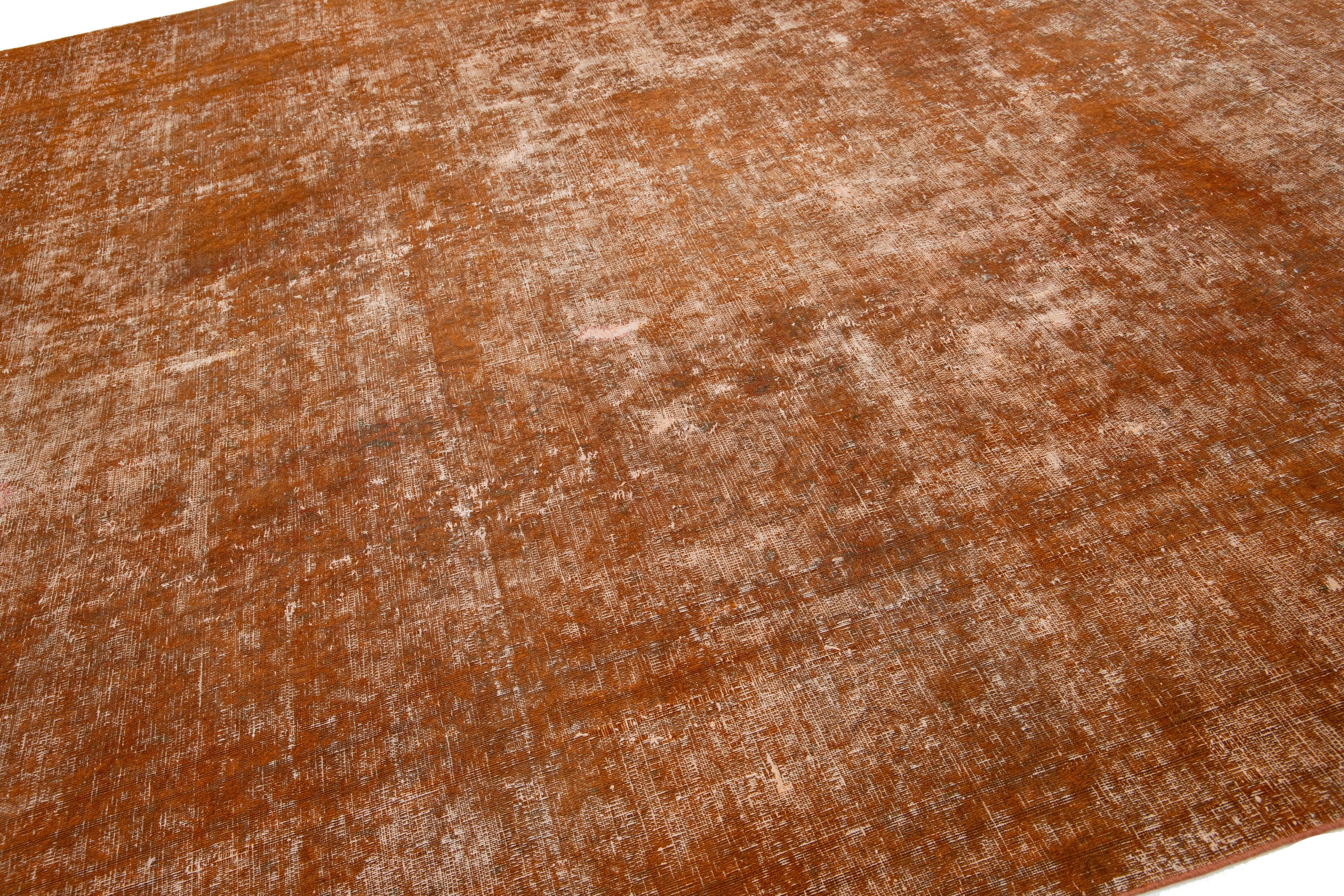 20th Century  Antique Room size Orange Wool Rug Persian Overdyed With Allover Pattern For Sale
