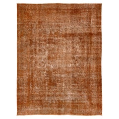  Tapis persan ancien en laine orange avec motif sur toute la surface