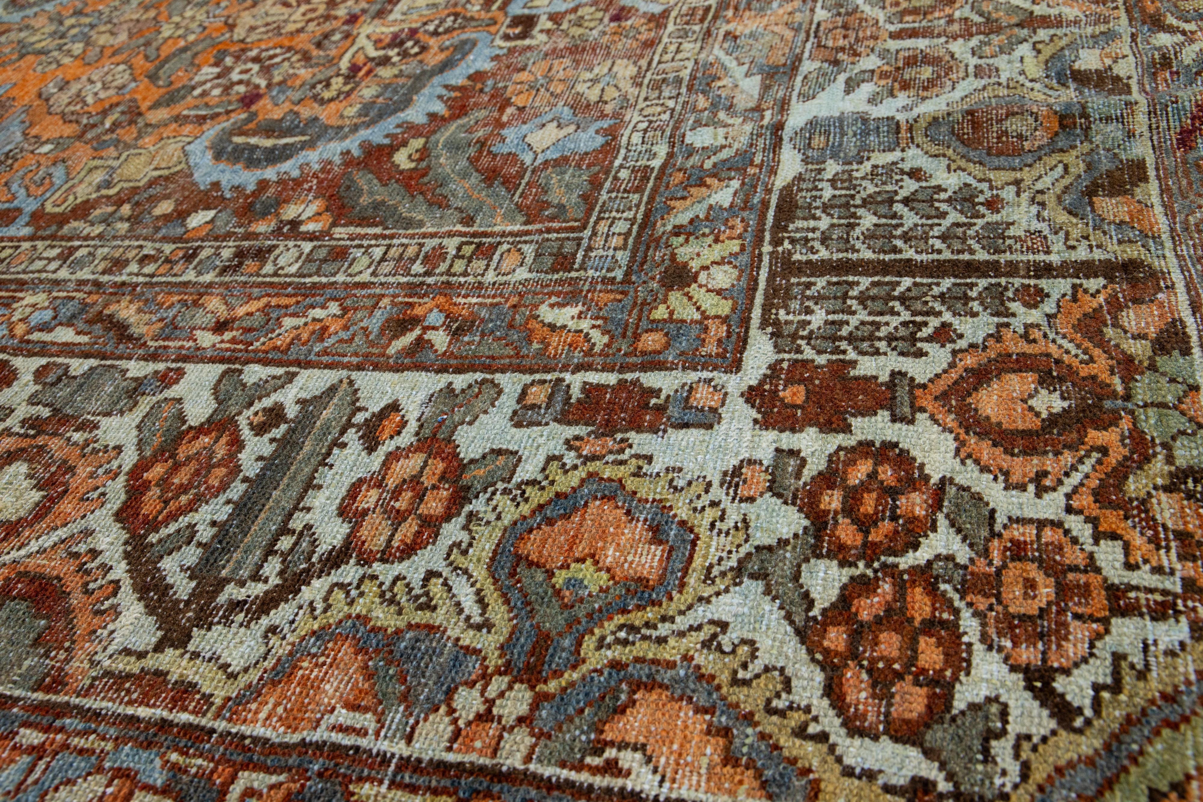 Islamic Antique Room Size Persian Bakhtiari Wool Rug Handmade In Red-Rust Color  For Sale