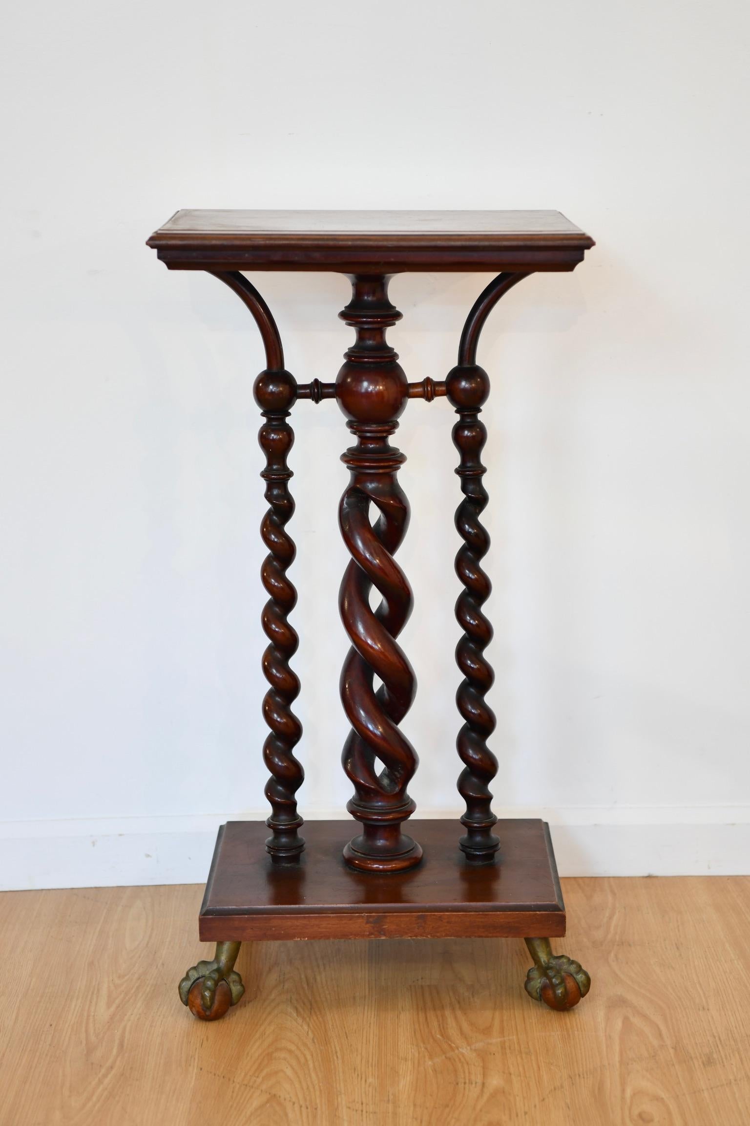 Antique rope twist mahogany pedestal with ball and claw feet, attributed to Merklen Bros or Horner Hunzinger. Dimensions: 17