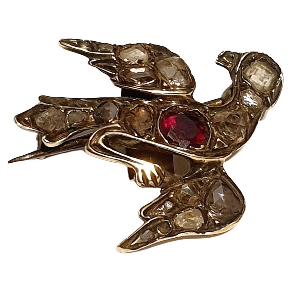 Antique Victorian Rose Cut Diamond and Garnet Swallow Bird Brooch Pendant In Good Condition For Sale In Cairo, EG