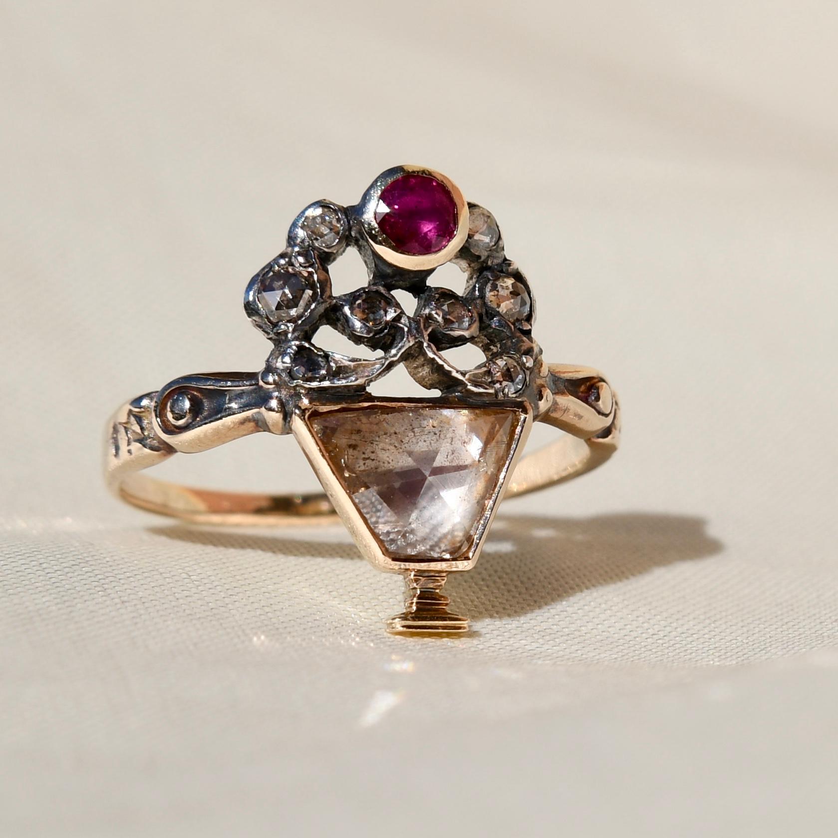 This ring was made in Europe circa 1760 and is in very good, antique condition. The gemstones do not show any signs of wear.

The “Giardinetti” or “Little garden” rings appeared at the very end of the 17th century but were favoured by aristocratic
