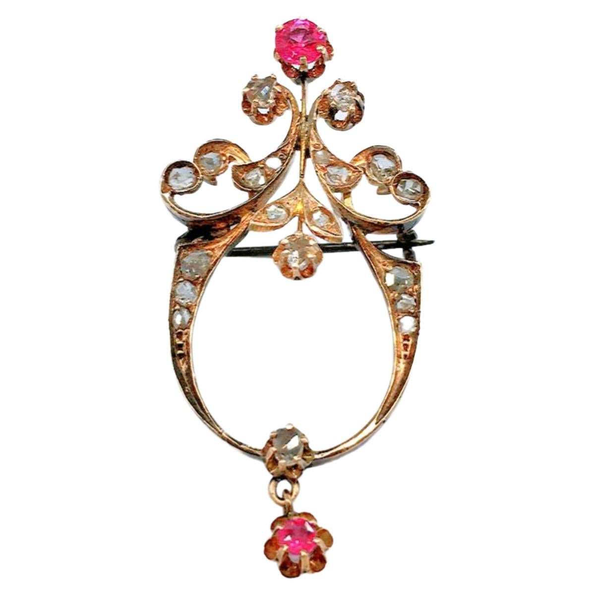 Antique 14k gold brooch in artnovo style with rose cut diamonds and ruby brooch was made during the imperial russian era 1907.c hall marked 56 imperial russian gold standard and cacouse assay mark