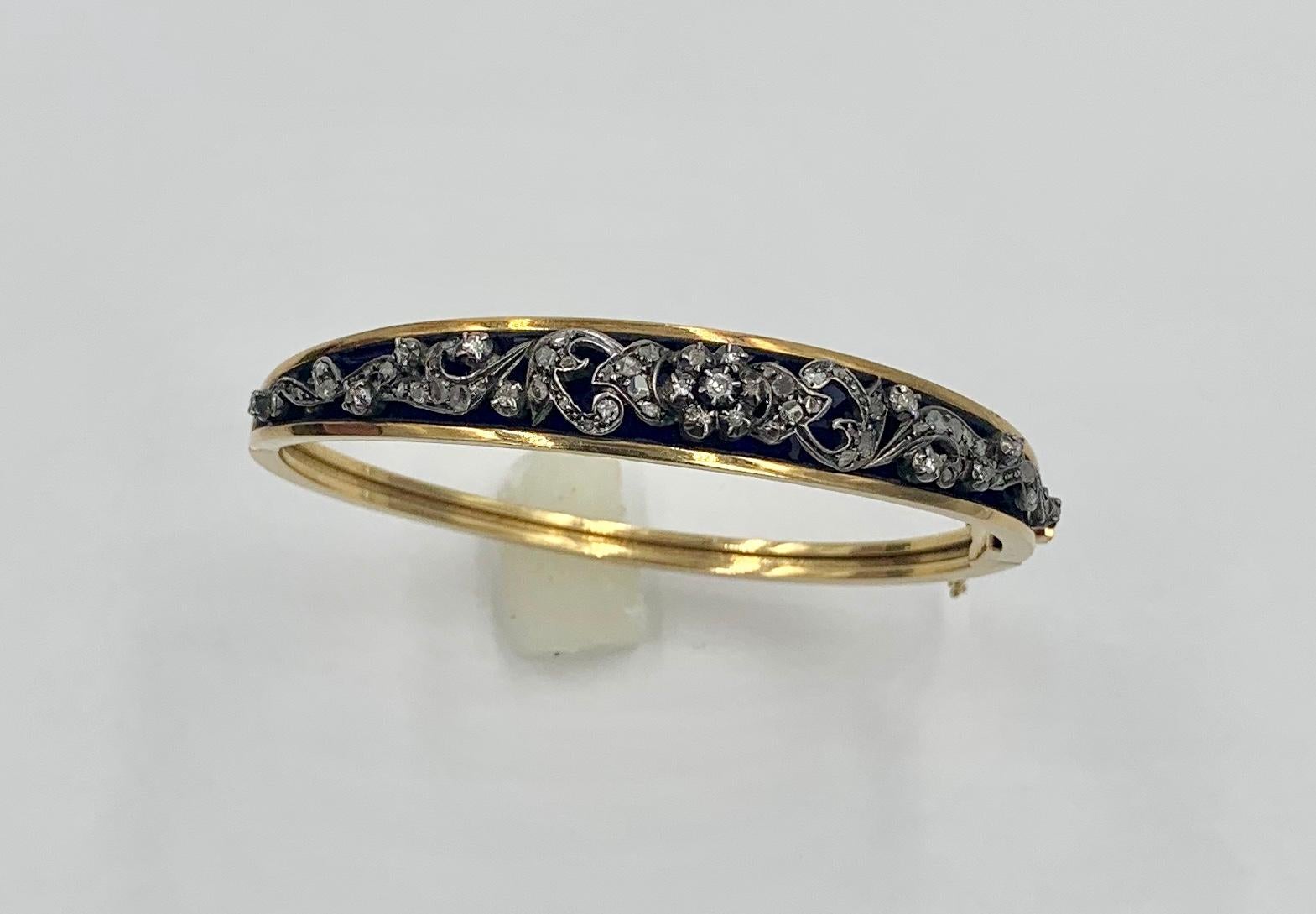 This is a stunning Museum Quality Antique Belle Epoque Rose Cut Diamond Bangle Bracelet with Royal Blue Enamel in 18 Karat Gold.  The magnificent bracelet dates to the Belle Epoque - Victorian period of the 19th Century.   Rose Cut and single cut