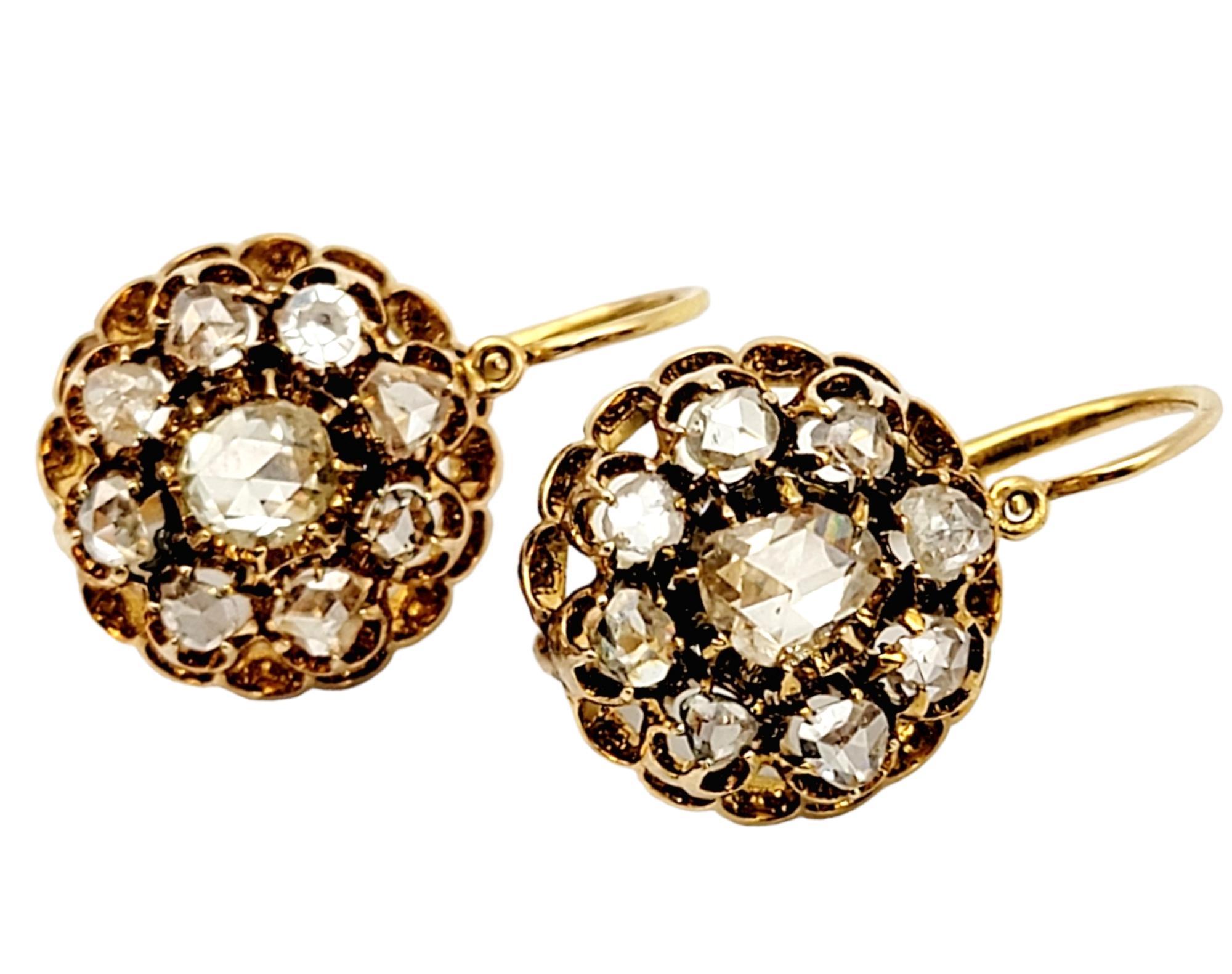 Exquisite vintage rose cut diamond dangle earrings. These simple yet elegant earrings offer the perfect hint of Old World style and sophistication, while giving off all the sparkle you want.

This gorgeous pair of floral motif earrings each feature