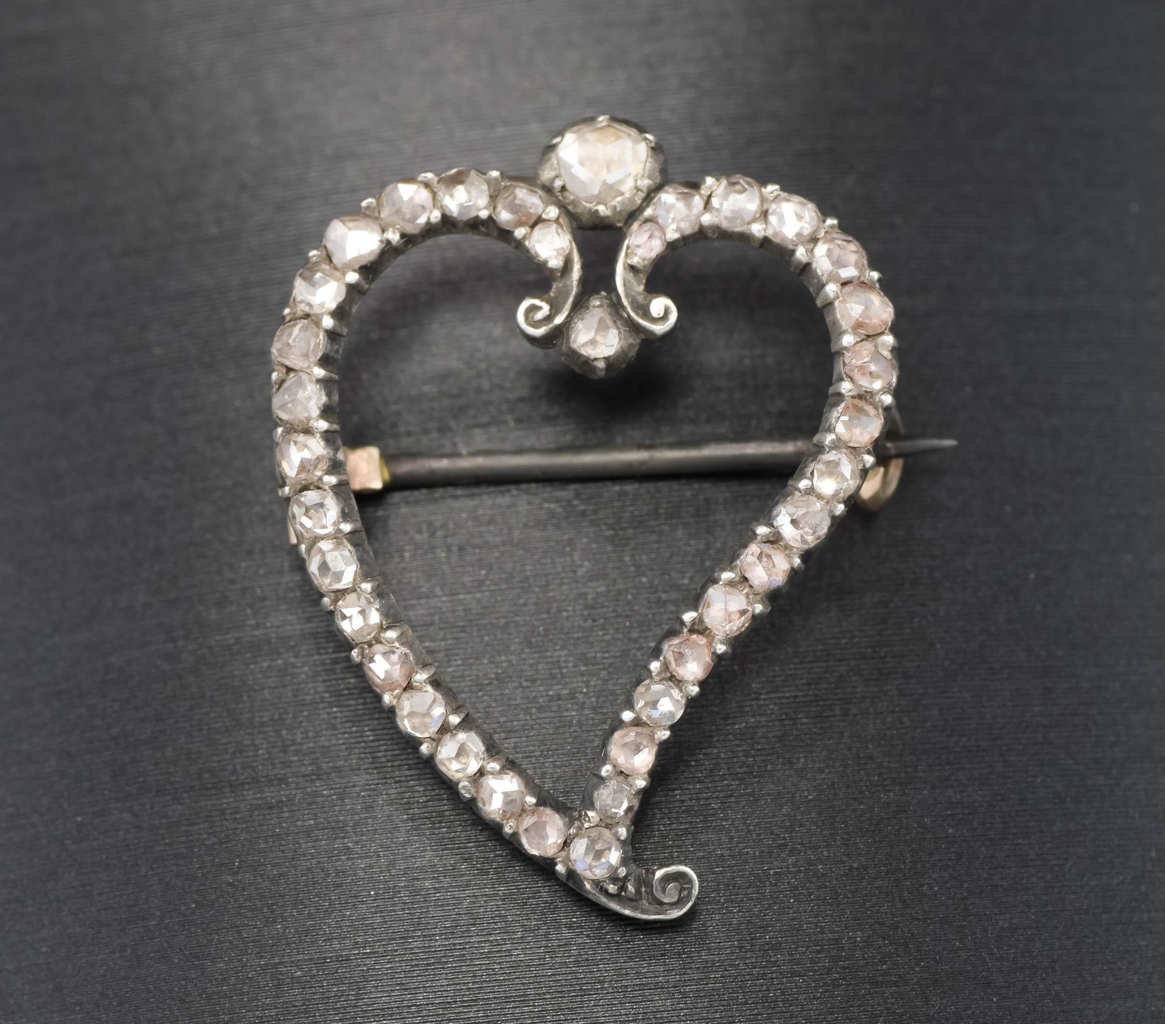 Offered is a very lovely antique rose cut diamond heart brooch from the Georgian period.  This type of heart is referred to as a 