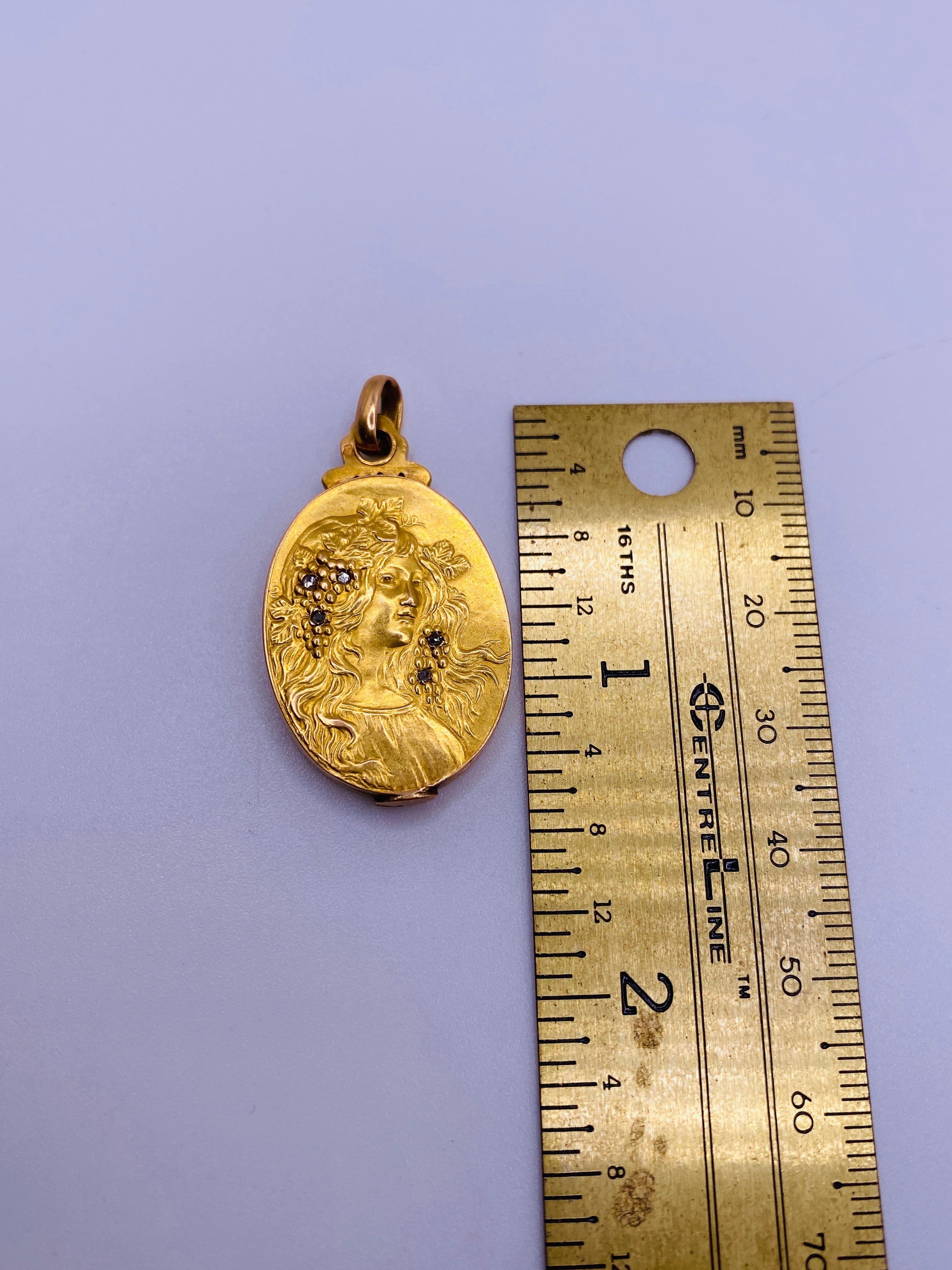 Antique 14k yellow gold locket with .03 carat total weight rose cut diamonds. 4.0Dwt