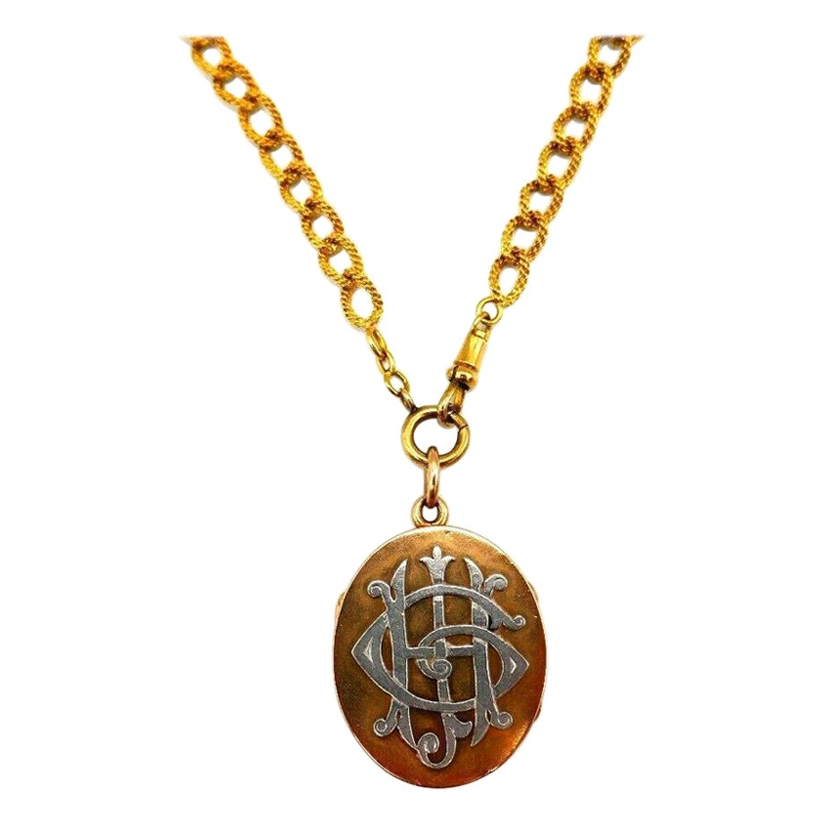 Collana con medaglione in oro rosa antico e catena di orologi in oro giallo in vendita