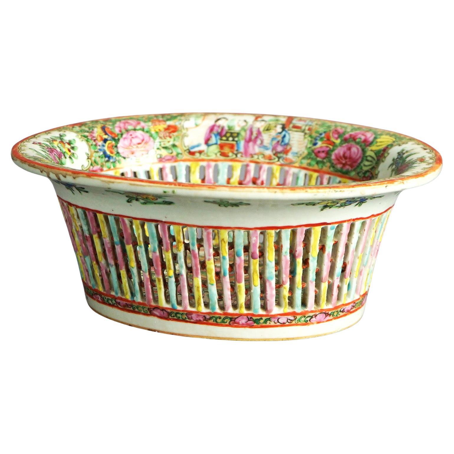 Antique Chinese Rose Medallion Reticulated Porcelain Basket with Hand Painted Garden & Genre Scenes C1900

Measures- 4.25''H x 10.75''W x 9.25''D