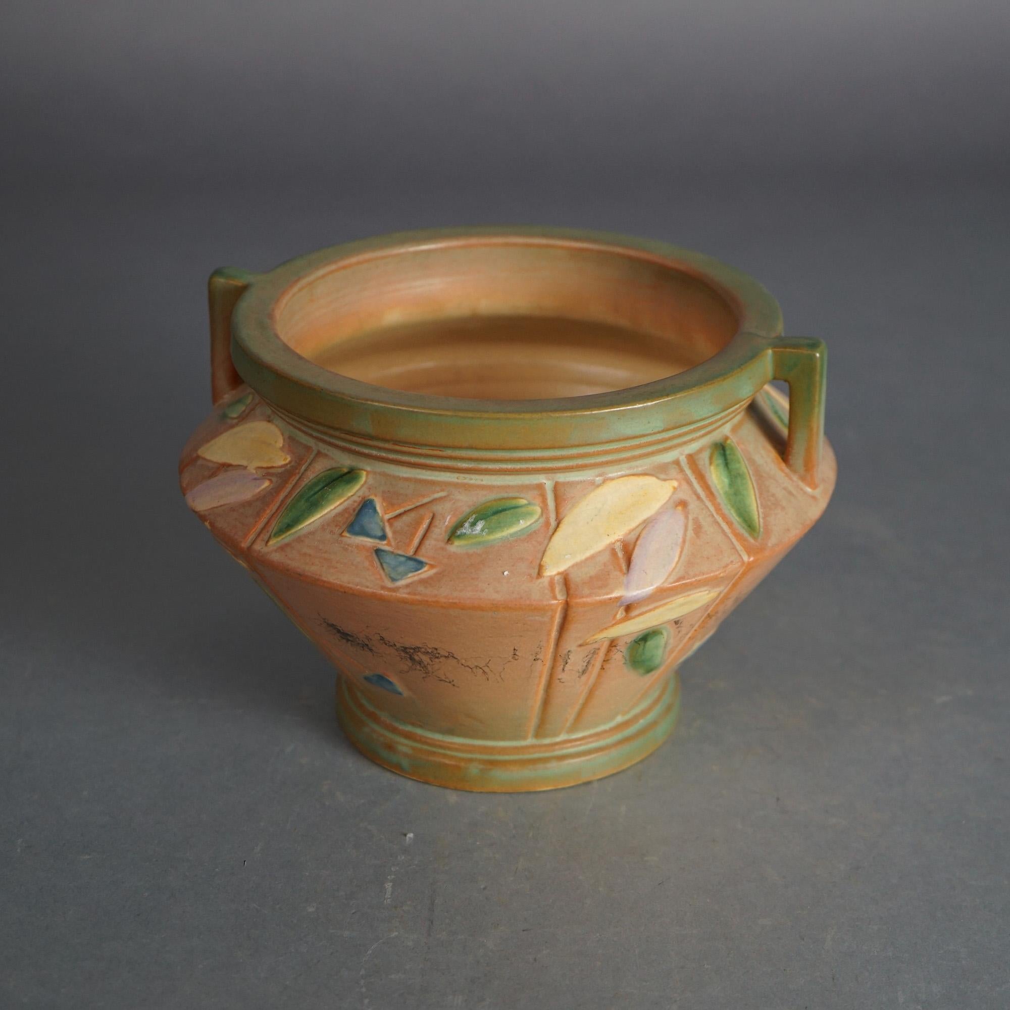 Antique Roseville Futura Art Pottery Jardiniere with Stylized Leaves C1920

Measures- 6''H x 9''W x 9''D