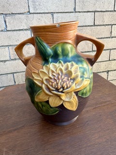 Antique Roseville Vase with beautiful Lily Design