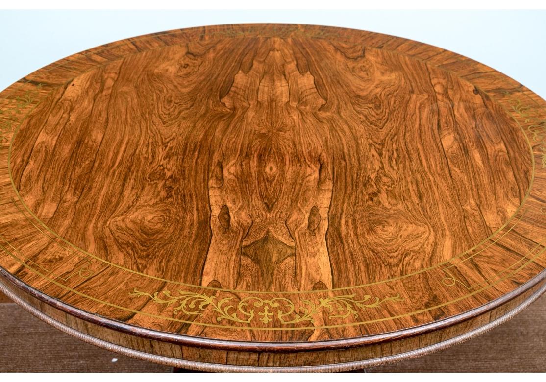 Table centrale ancienne en palissandre avec incrustation en laiton en vente 12