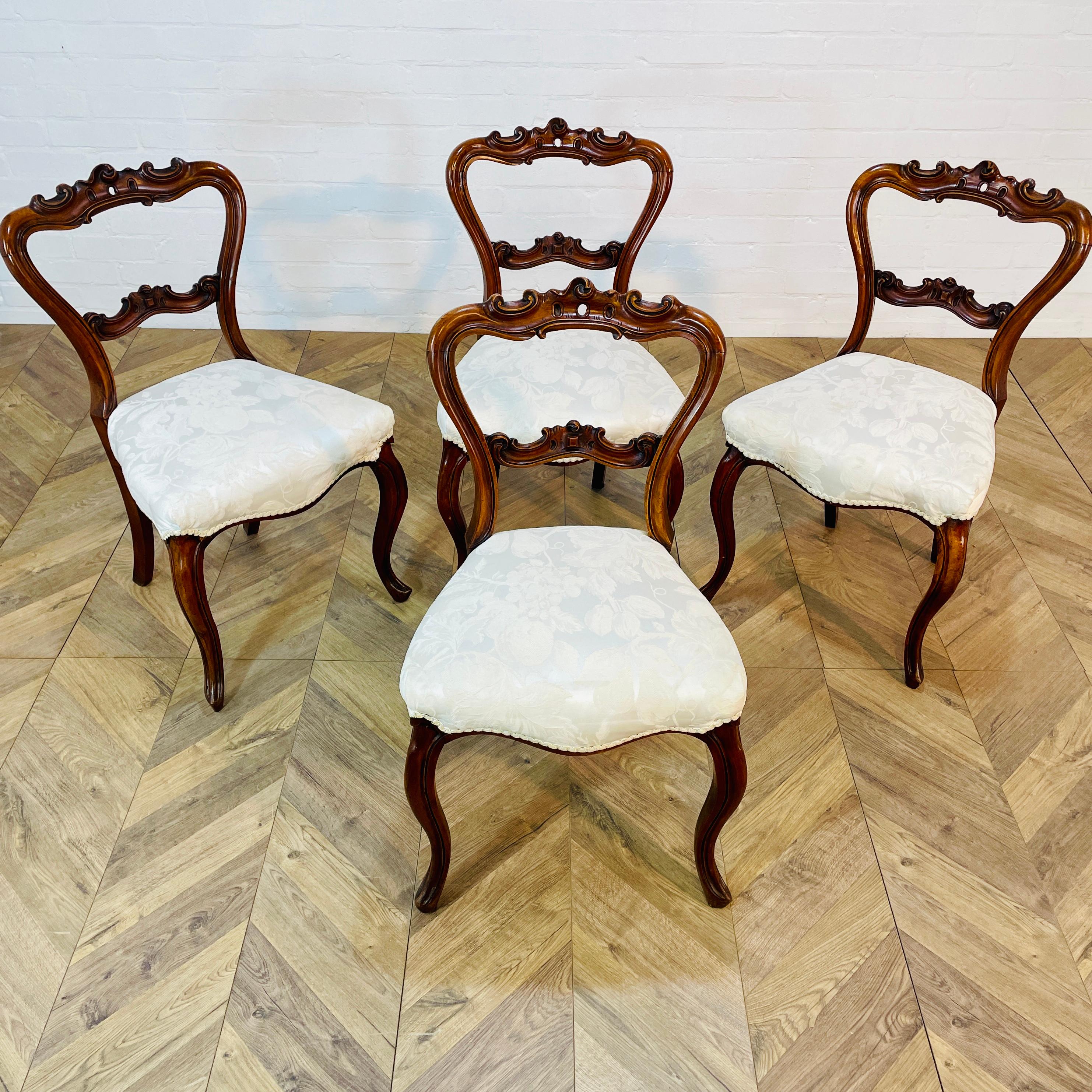 Set of Four Wonderful Early Victorian Solid Rosewood Dining Chairs, Circa 1840-1860. 

They are of superb quality and have beautiful form, with curvaceous backs & cabriole legs. 

The solid rosewood frames are superbly carved and in good solid