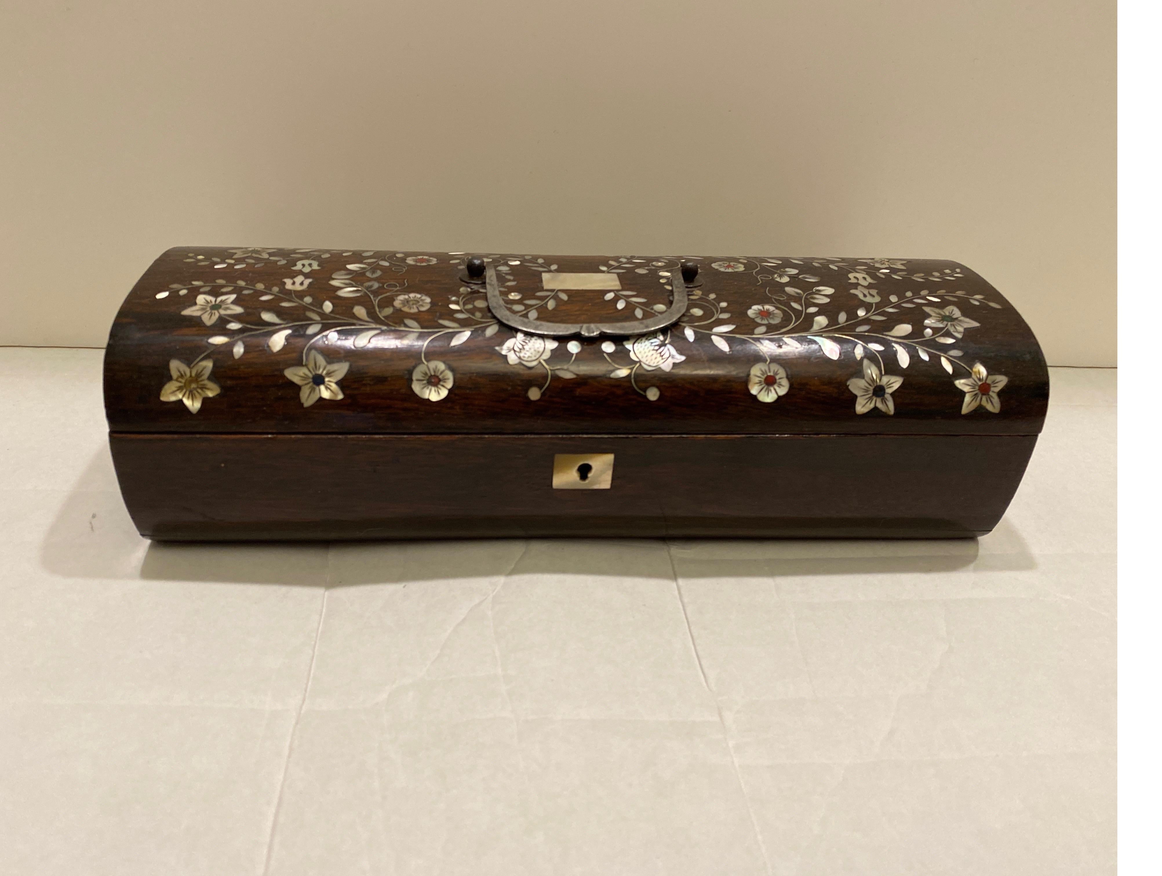 Elegant Anlo-Portuguese rosewood inlaid domed hinged box. The rich warm wood with floral inlays of mother of pearl and silver wire. 9.5 inches wide.