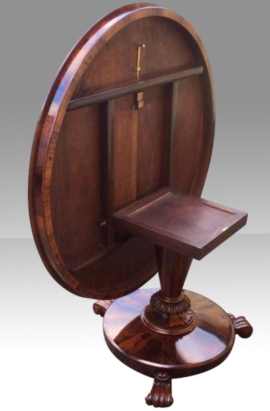 Superb Quality William IV rosewood tilt top circular centre table / dining table /hall table with Pedestal Base and carved feet of small proportions .
Measures: 124cm diameter x 74cm tall
(48.5ins diameter).