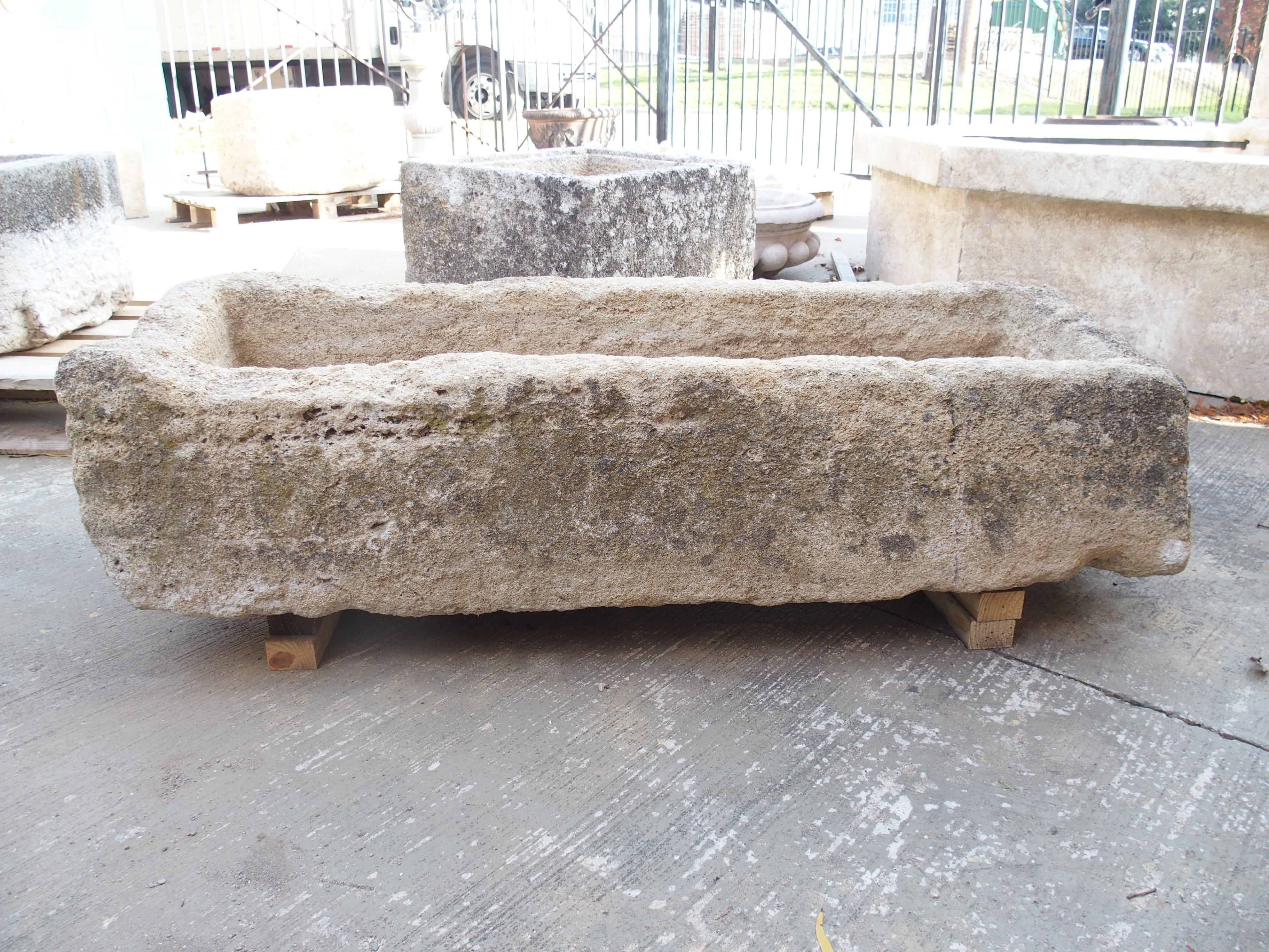 Dating to the early 1800s, this limestone farm trough from France has been hand-carved using a technique known as rough-cut. Artisans use this technique to excavate large amounts of sculpting/carving material before typically using a finer