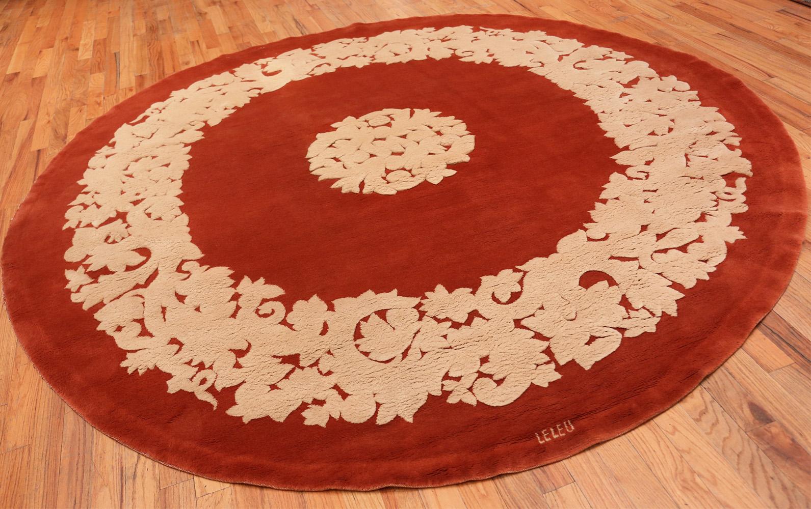 Magnificent antique red color round French Art Deco Leleu rug.