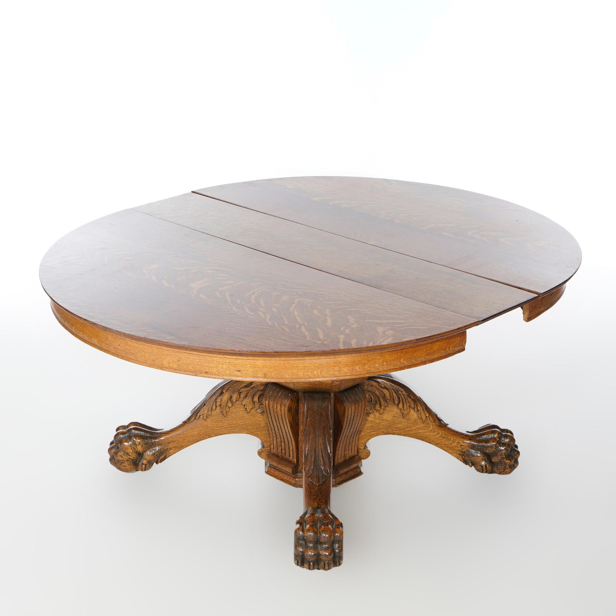 round oak dining table with claw feet