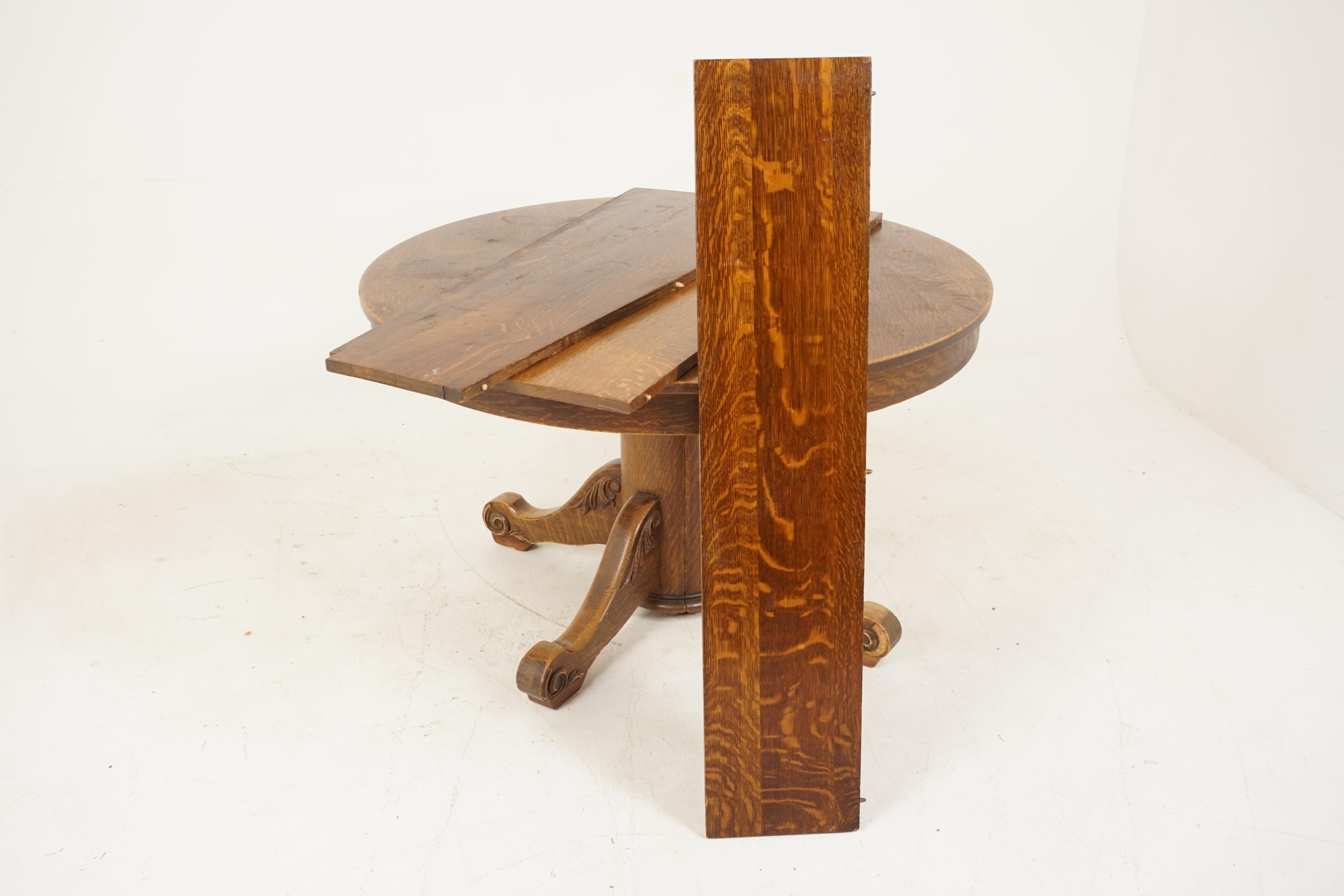 antique round oak dining table with leaves