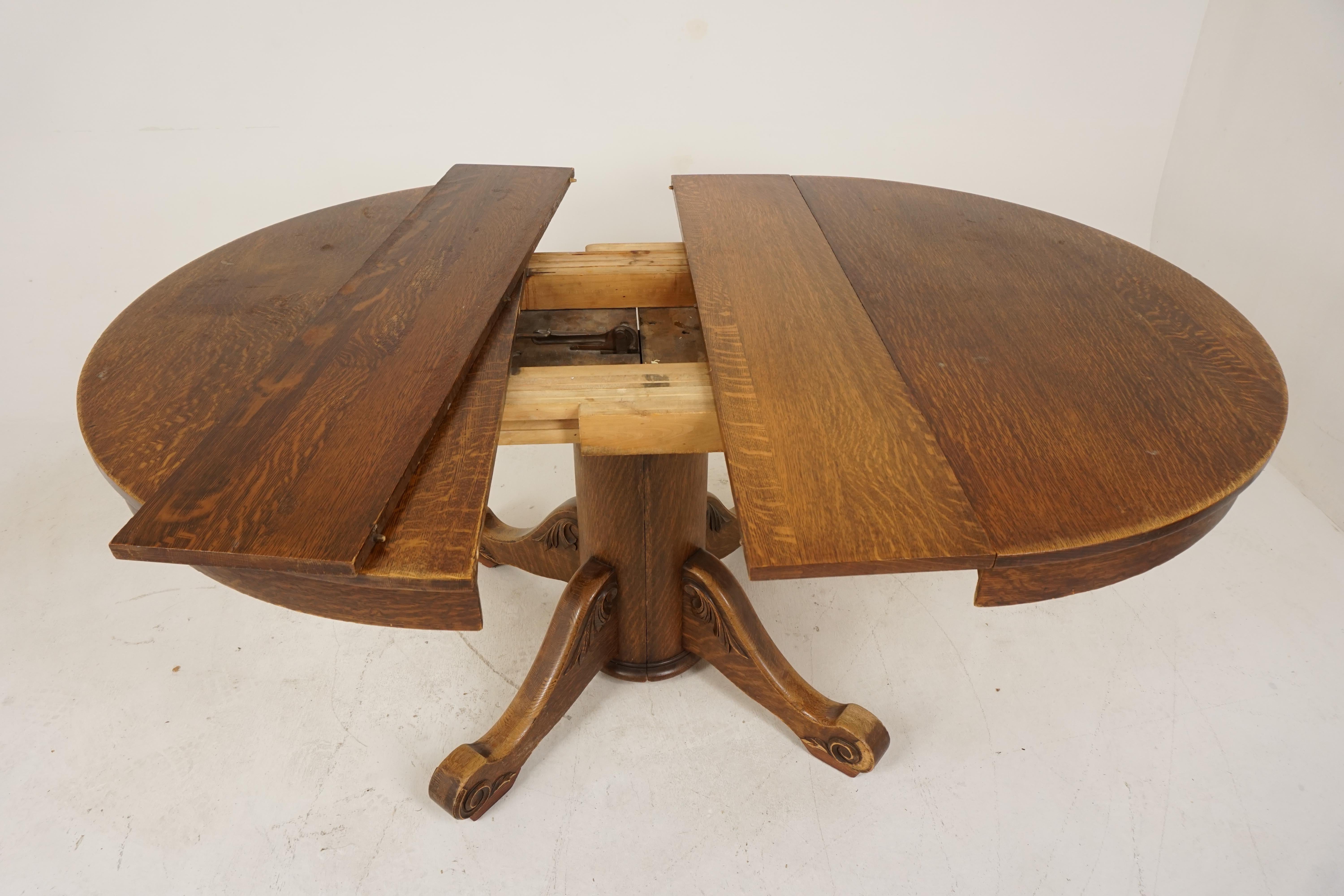 antique round oak dining table with leaves