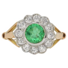 Antique Round Emerald Diamond Cluster Engagement Ring