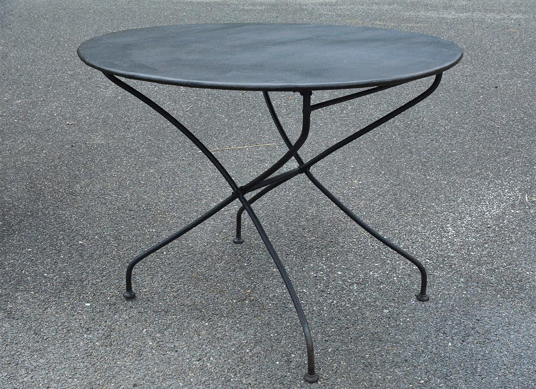 The French outdoor or outdoor garden iron bistro dining table folds flat for easy storage. Can be used as dining table in the garden room, porch, patio or kitchen. Some have used these as side or end table.
Measures: Height folded - 44.50