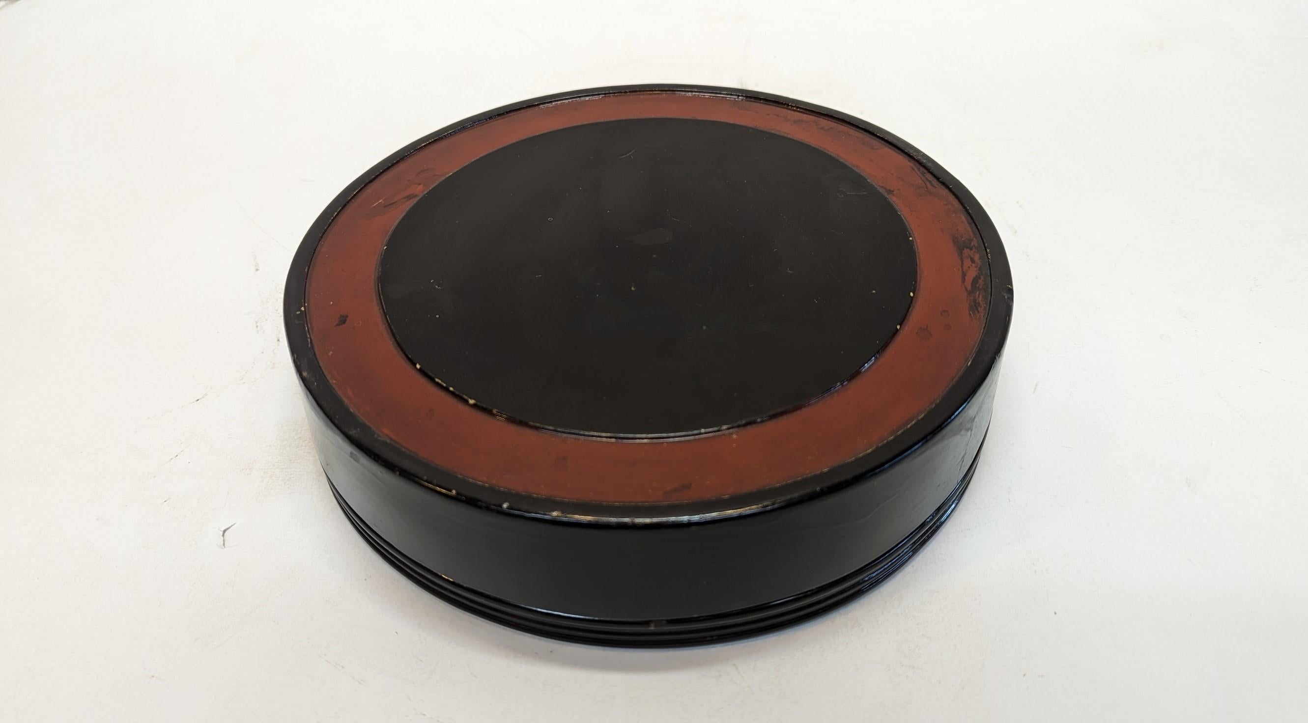 Antique Deco Round Lacquer Box.  Antique Chinese Round Lacquer Box used for special delicate sweets and or holding special jewelry.  Art Deco period in Shanghai, 1920-40.  Constructed wood with gesso and lacquers.  The inside has a star shaped