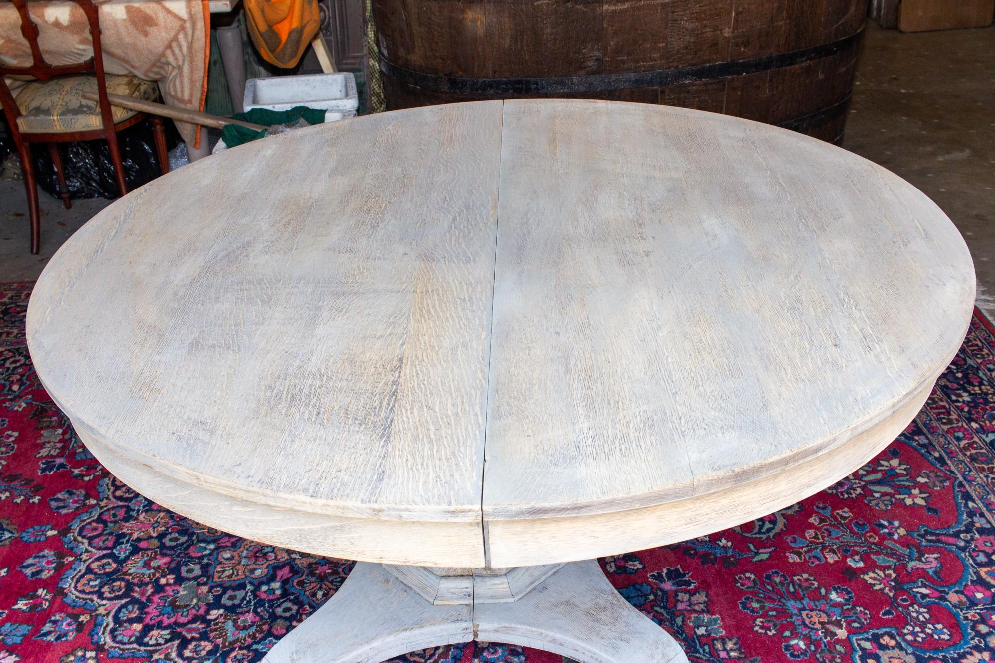 Antique Round Oak Pedestal Table in Light Greige Finish with Extension Leaves 1