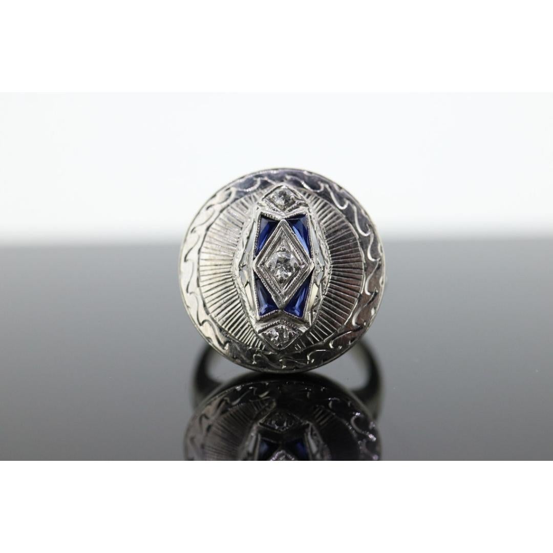 Vintage from the 1930s
Size: 5 1/2 US
Materials: Gold
Gemstone: Diamond
Gem color: Colorless
Band color: White

Style: Art deco

About this item

Very beautiful Art Deco diamond and sapphire ring. ROUND Shield design with Three diamonds set in a
