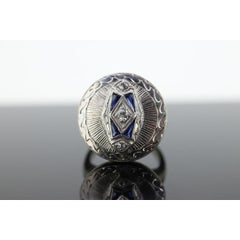 Antique ROUND SHIELD ring. 14k TRILOGY three diamond and sapphire shield ring.