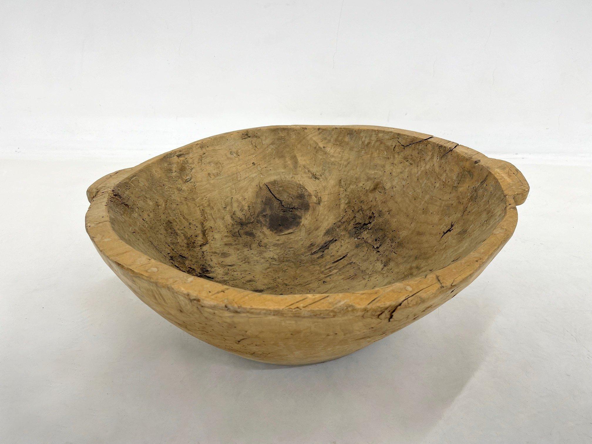 Antique wooden dough bowl in unrestored, untreated original condition. A beautiful home decoration that can be used in many different ways.