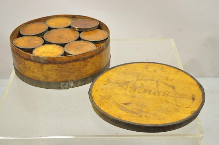 Antique round wooden kitchen pantry shaker spices box set jars. Item features a wooden round box, small spice boxes on the inside, original labels, very nice antique set. Circa 1900. Measurements: 3.5