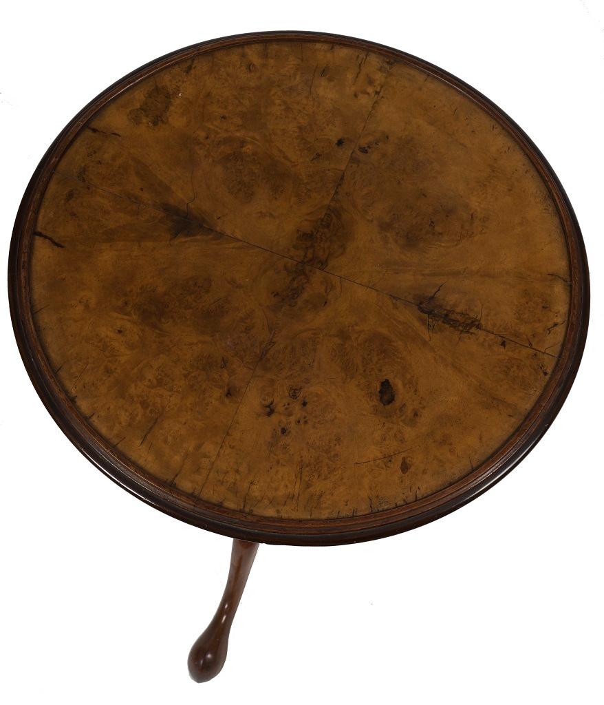 Antique round table is a piece of original design furniture realized in the 19th century.

Antique coffee table in walnut and walnut briar, with a pedestal base supported by three curved legs.

This object is shipped from Italy. Under existing