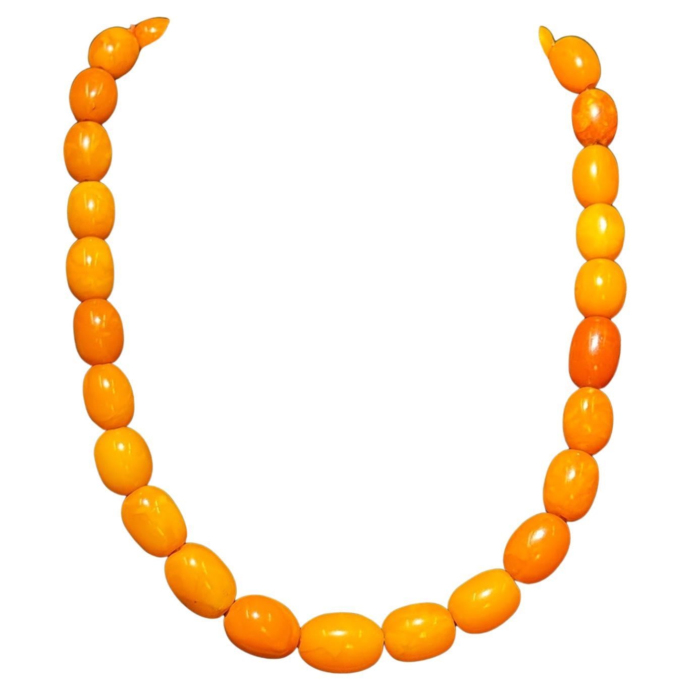 What do amber bead necklaces do?