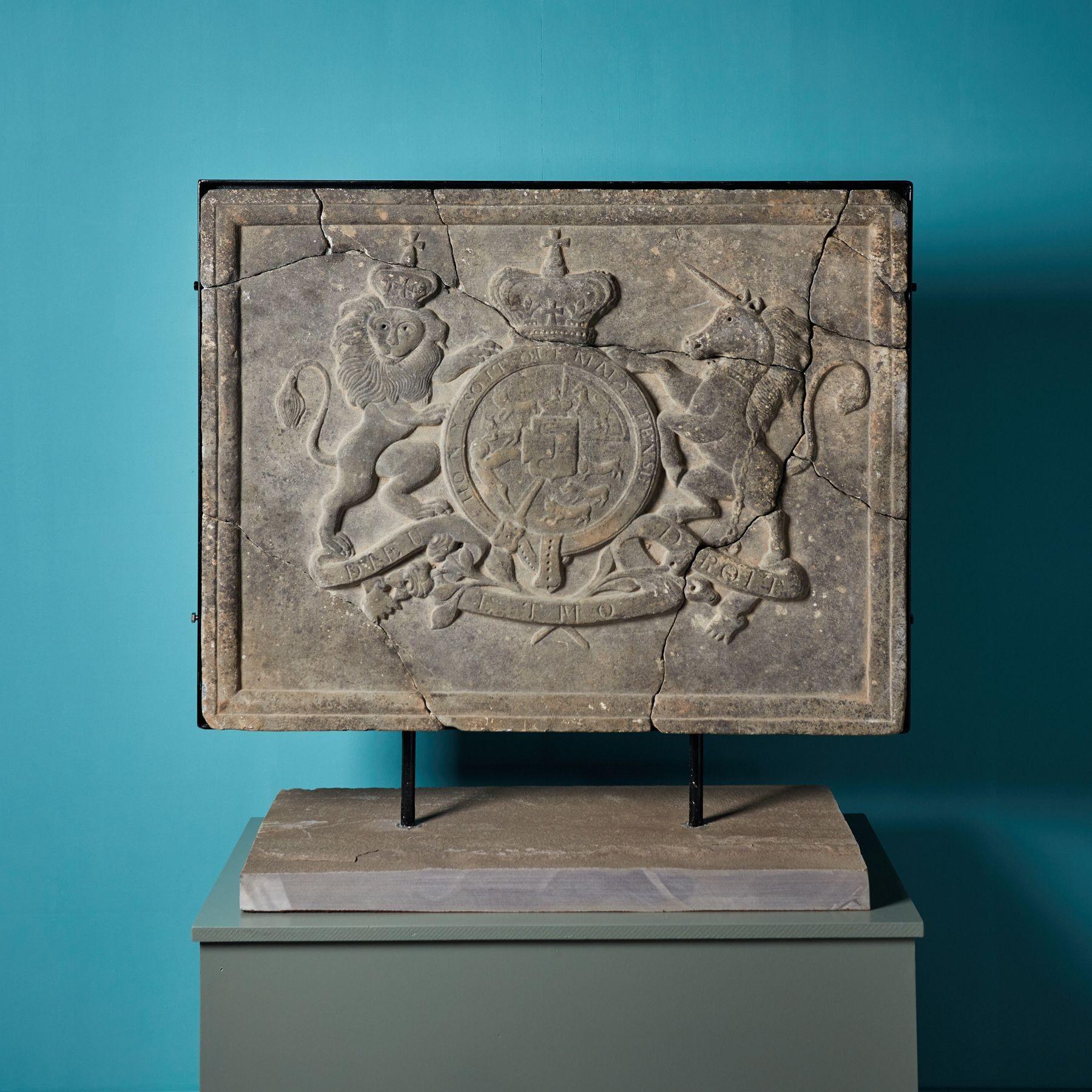 Antique Royal Coat of Arms crest C. 1775. A late Georgian period wall crest. This was fitted to a judicial building in Stoke on Trent. It is carved from white Carrara marble.

The panel has been mounted into a custom steel frame, set into a piece