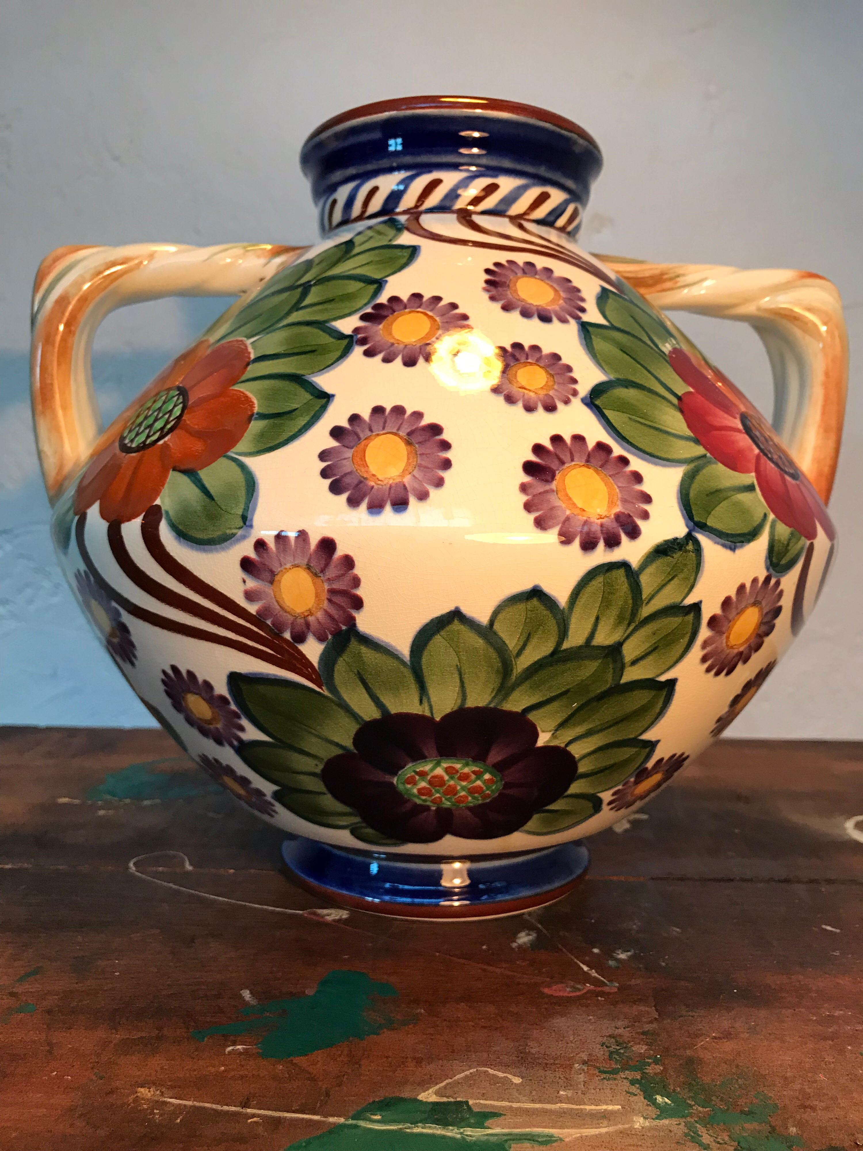 Antique vase by Royal Copenhagen Aluminia from 1908
Beautiful hand painted floral designs and colors.
No cracks or chips.
