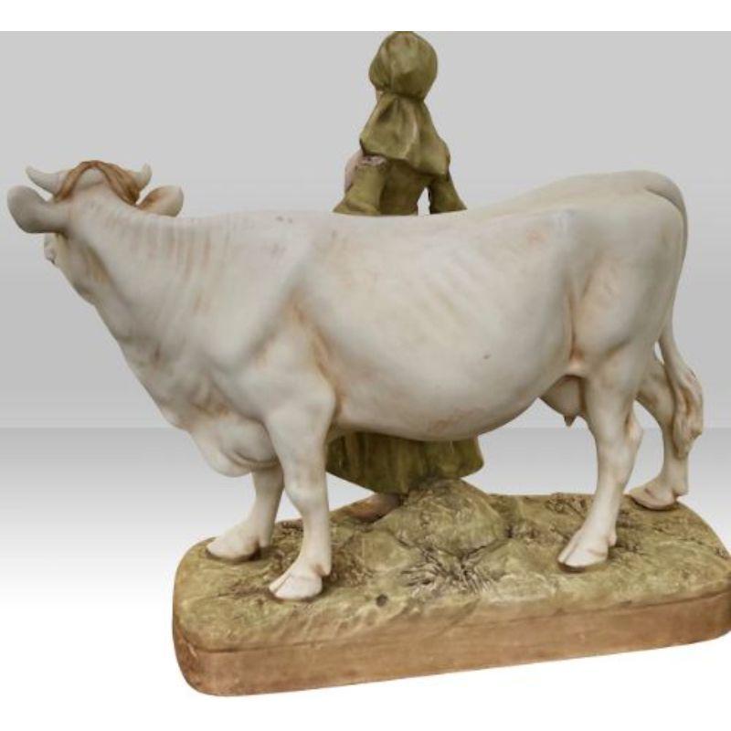 Antique Royal Dux figure group of cow and milk maid

Circa 1900
11ins x 12.25ins x 5.5ins

Declaration: This item is antique. The date of manufacture has been declared as 1900.

Dimensions:
Height = 28 cm (11.0