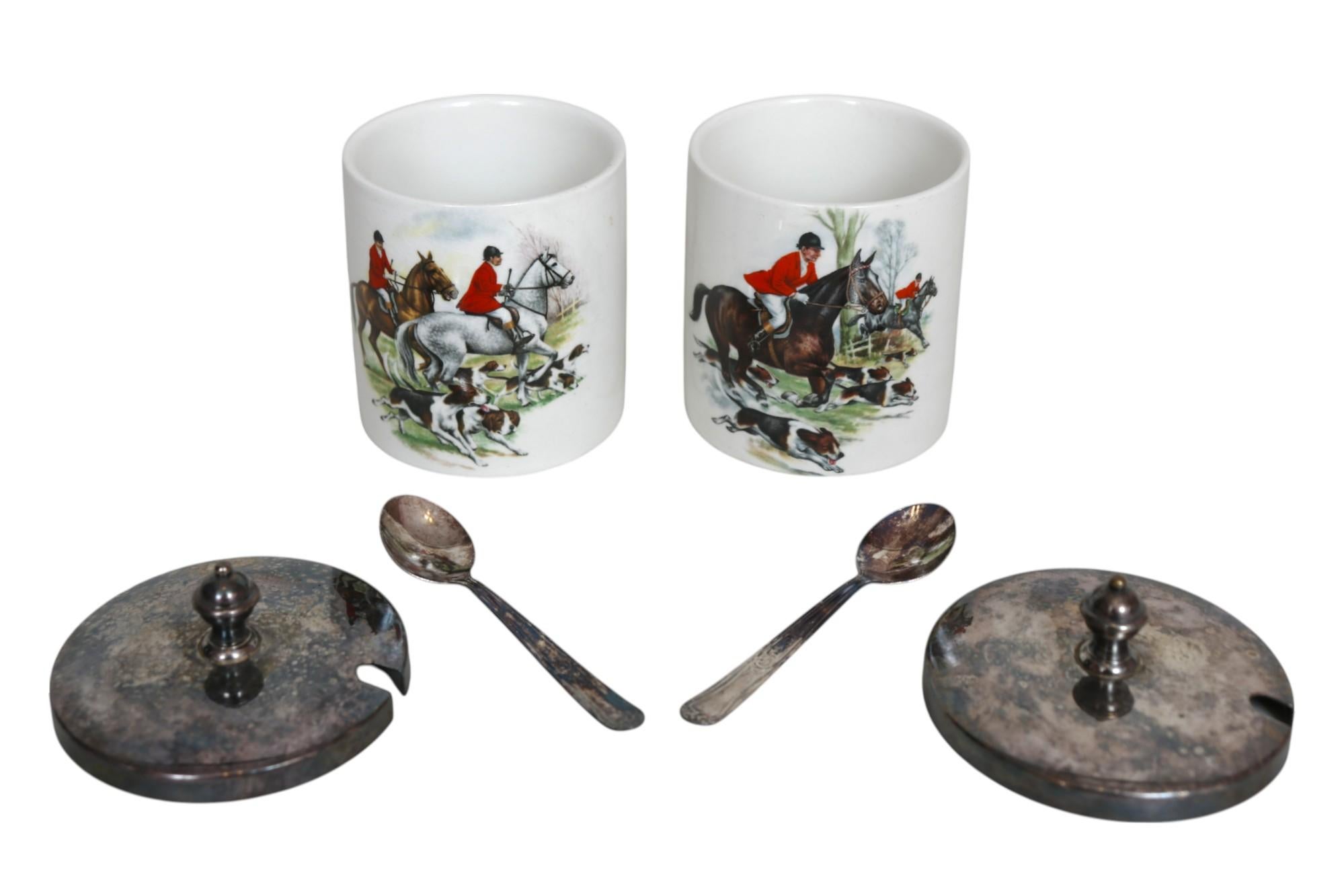 A matching pair of English fine china lidded sugar bowls with spoons made by Royal Norfolk of Staffordshire, England circa the late 1800’s. Each depicts a hand painted English hunting scene, with foxhounds and men on horseback in red jackets riding