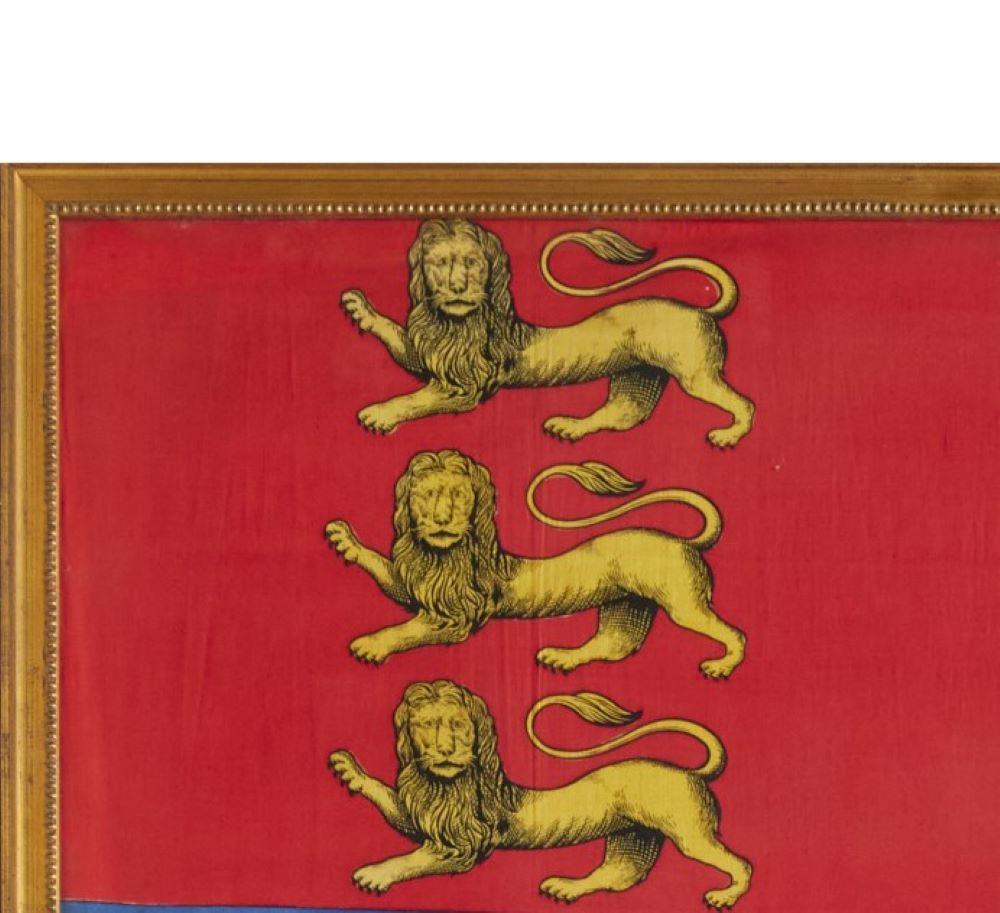 An antique Royal Standard of the United Kingdom, possibly by Benjamin Edgington, London. The fabric is in a giltwood frame under glass. Each of the four quadrants on the flag represent England, Ireland, Scotland and Wales. The Lion Rampant is a