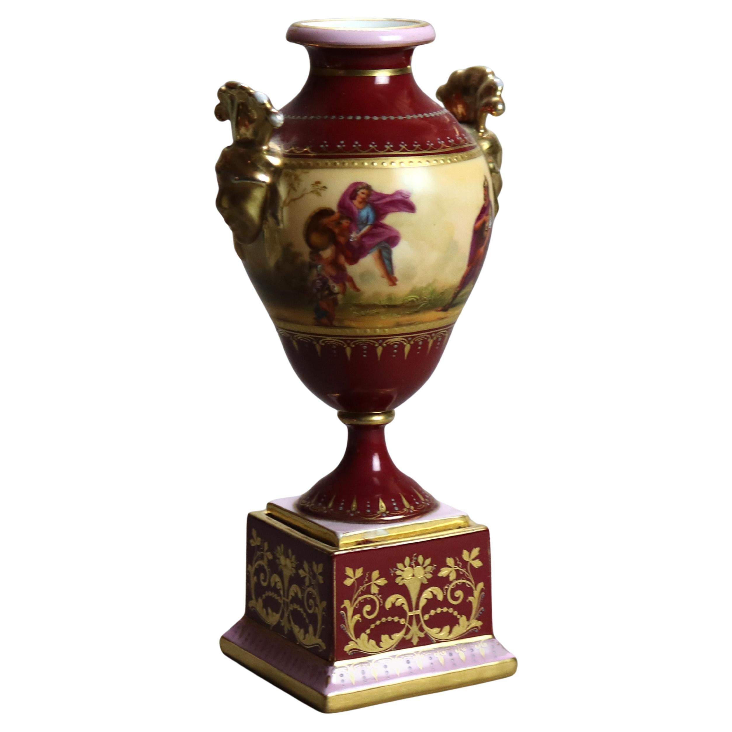 Antigua urna de porcelana pintada a mano y dorada Royal Vienna Porcelain C1890

Medidas - 9,25 