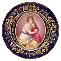 Plato antiguo de la Real Viena "El abrazo de la madre y el niño" pintado por S. Stanley