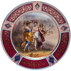 Ancienne assiette en porcelaine scénique royale de Vienne signée K. Weh