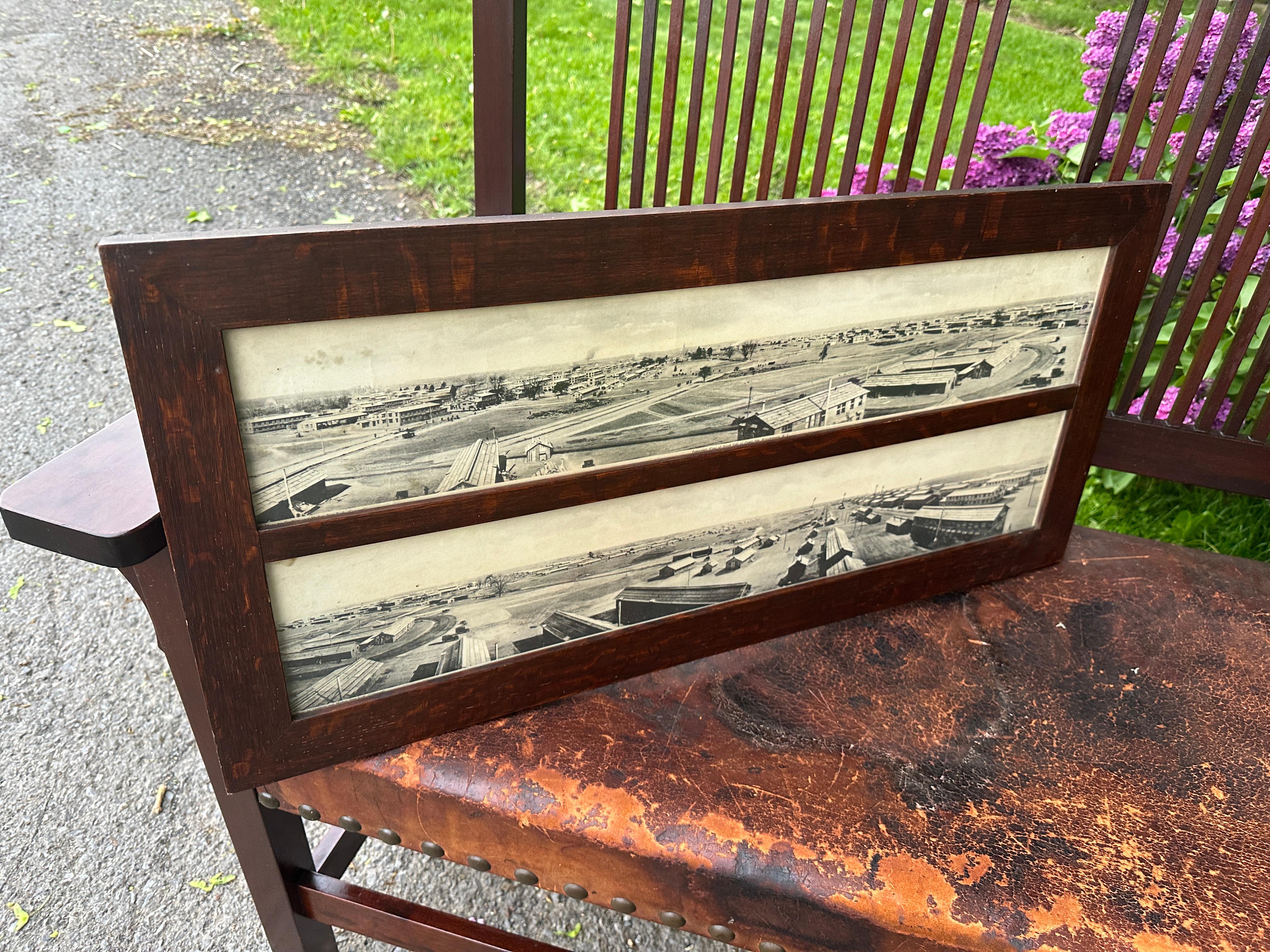 This is an antique Roycroft Double Picture Frame.  It's made from a great selection of quarter sawn oak.  It's ready to hang.

The images currently in the frame are black & white drawings of a military installation in New York in the 1930s.

-W1111