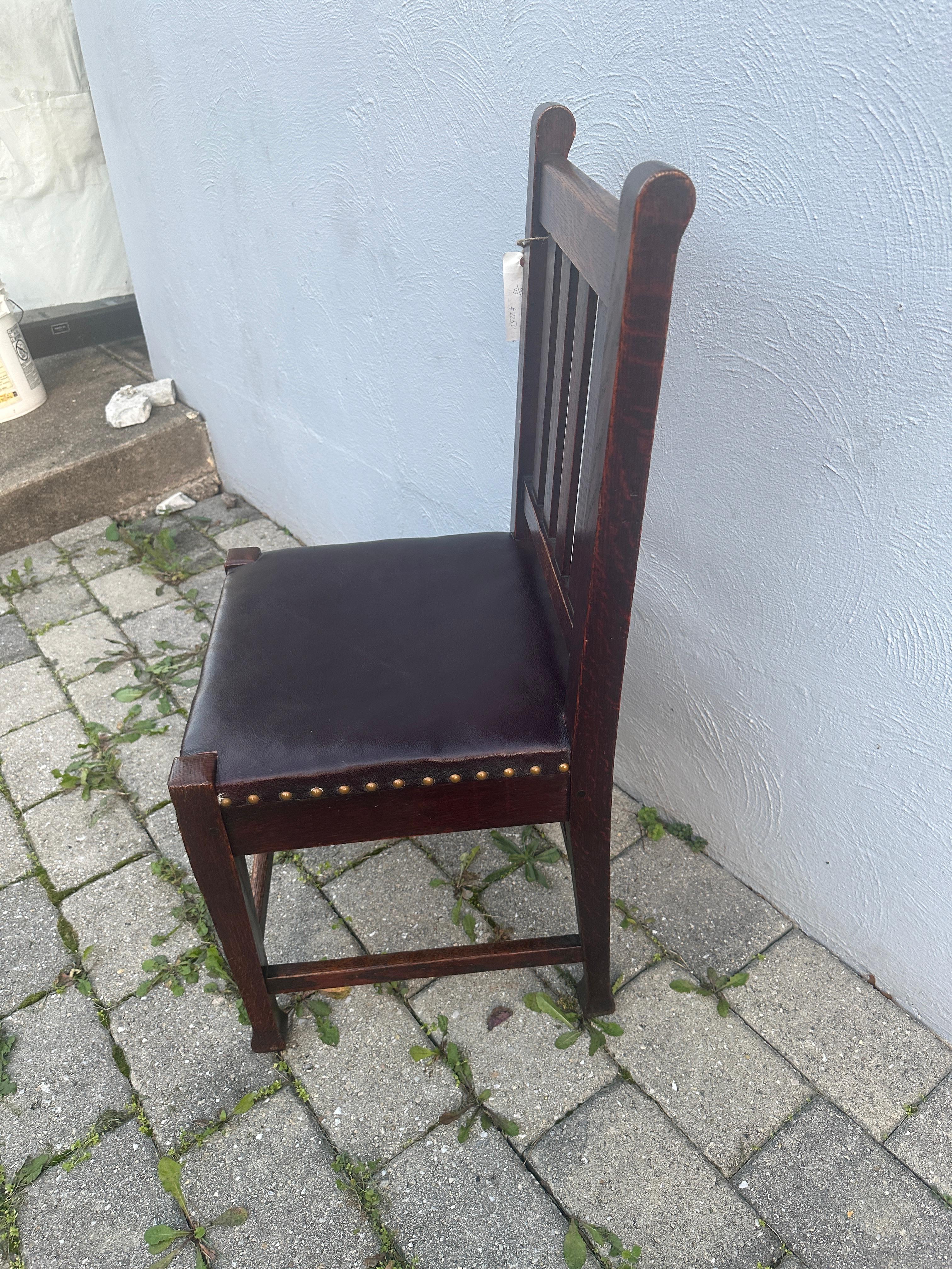 This is a rare Roycroft side chair from the early 1900s. In excellent condition.  The leather seat is in good condition and is most likely original.  The chair is marked (as seen in photos).

We have many Roycroft chairs and furniture in our shop. 